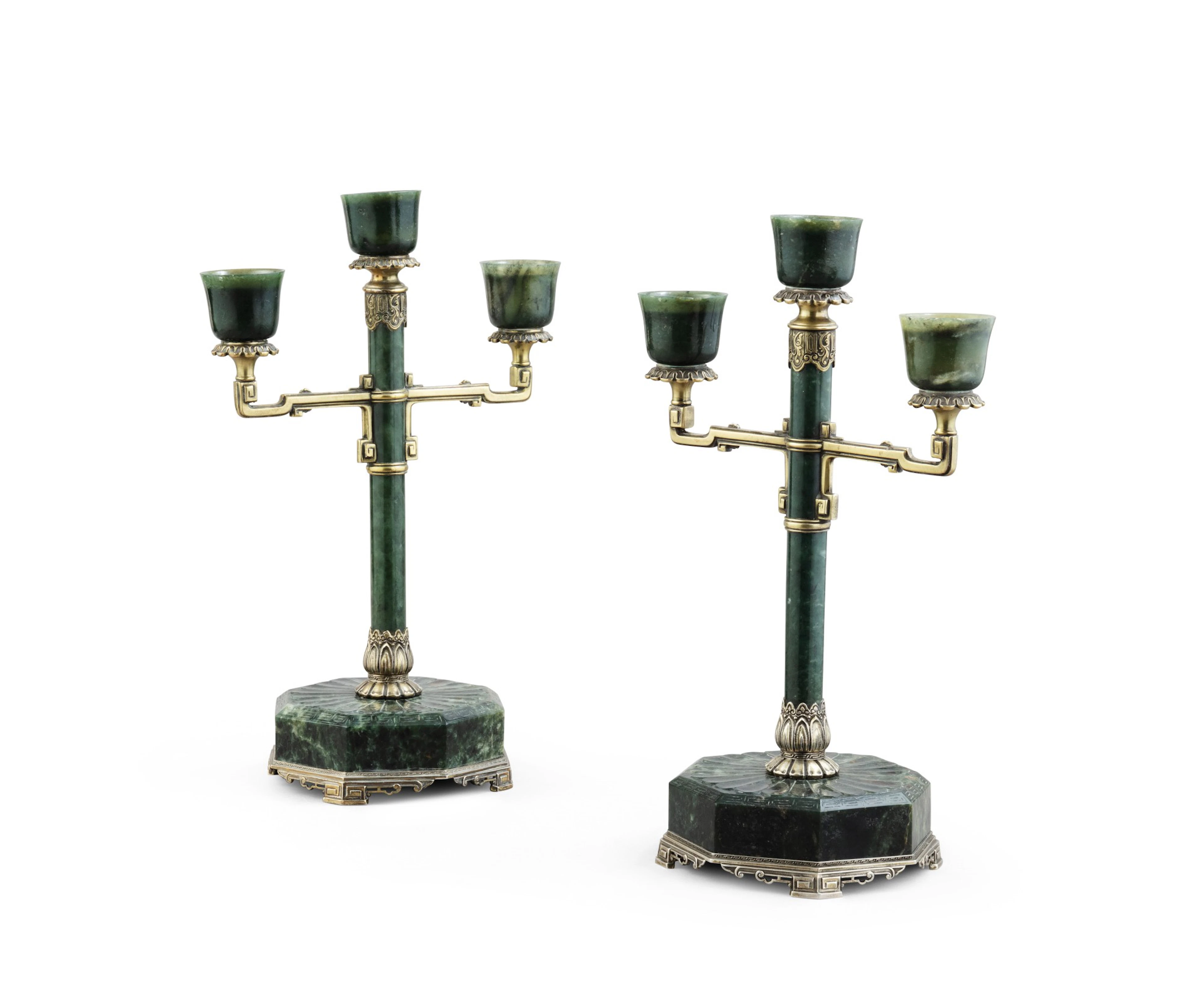 A pair of American silver-gilt and jade three-light candelabra