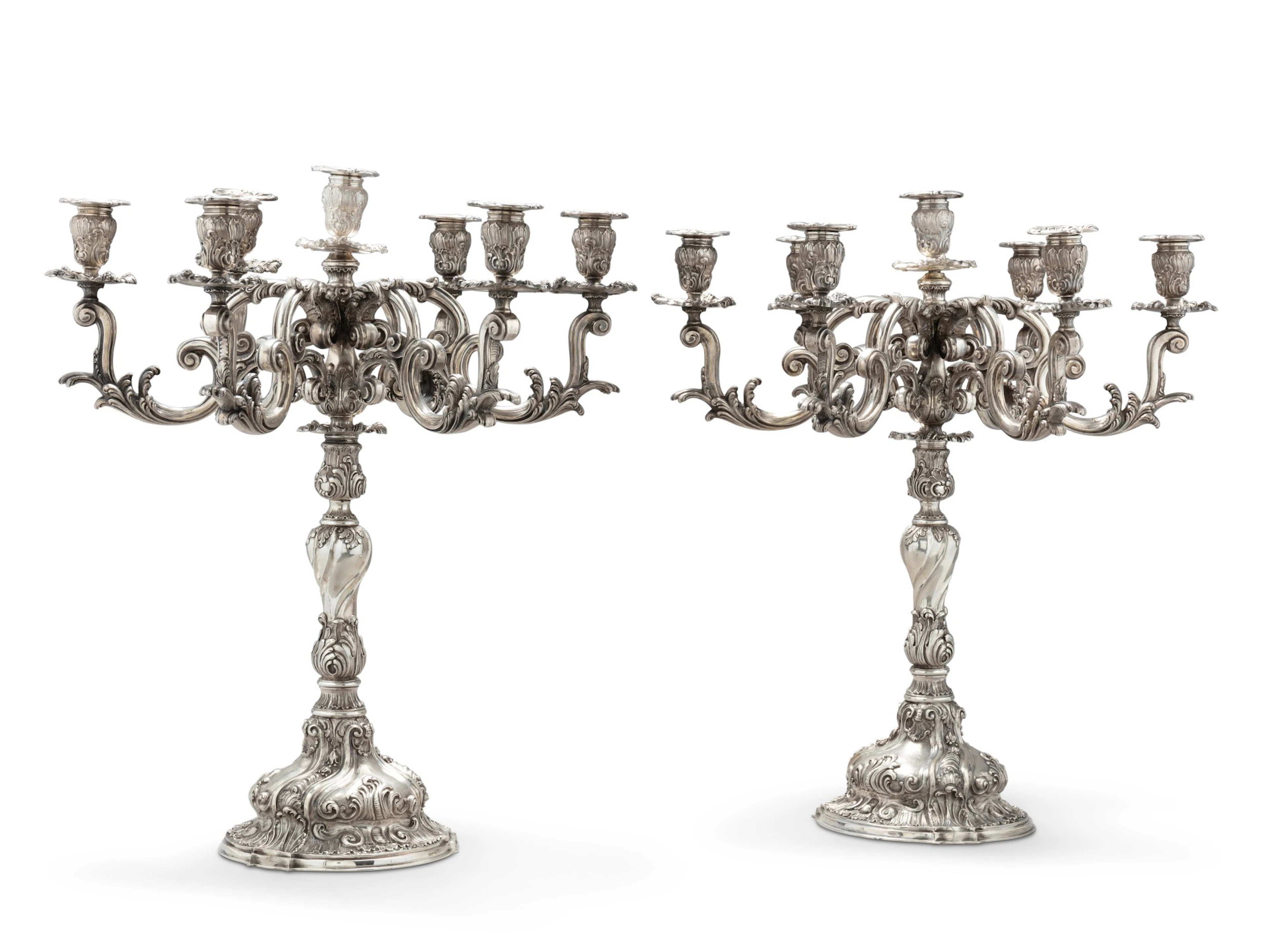 A pair of large seven-light silver candelabra
