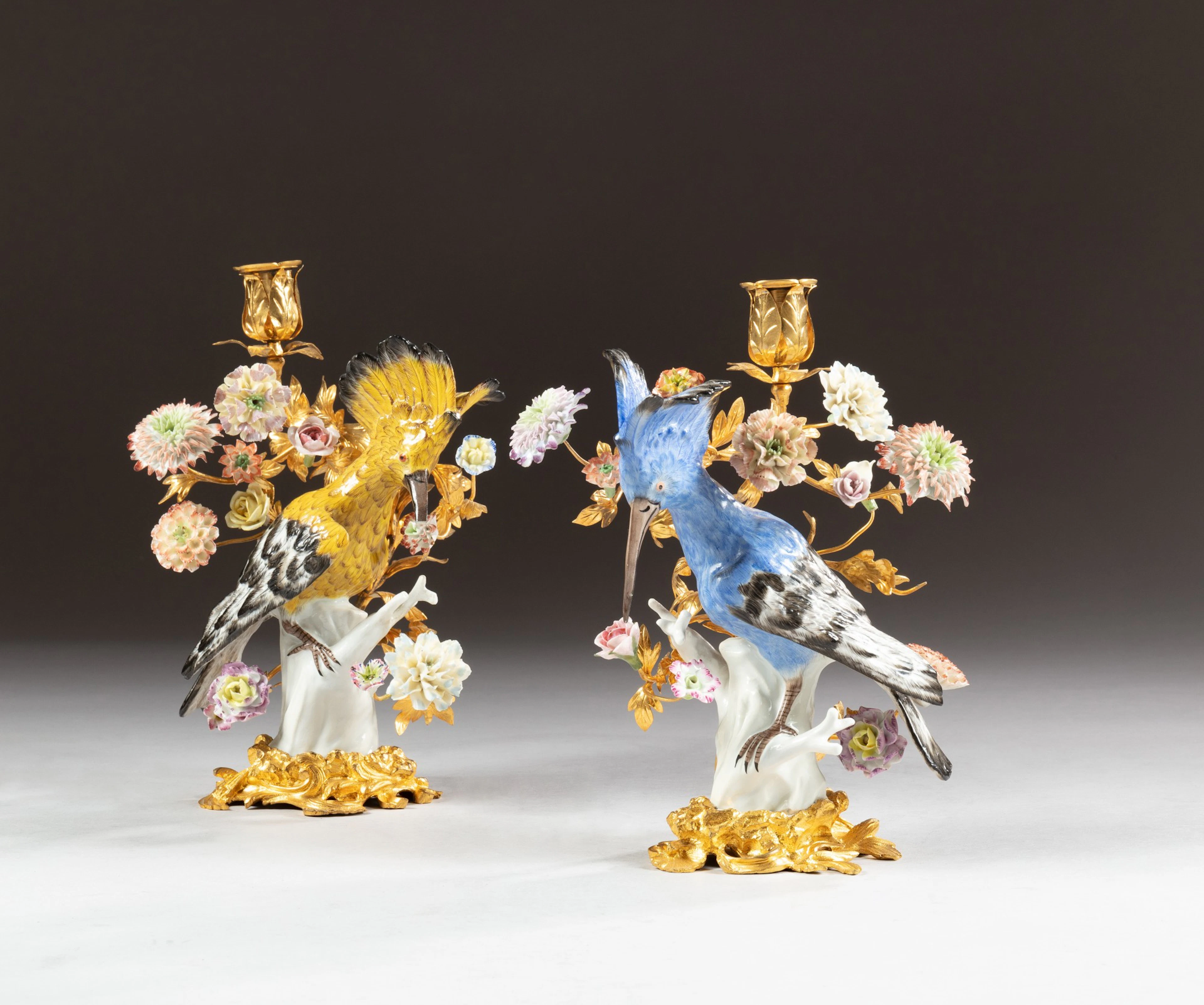 A pair of Louis XV style gilt bronze candlesticks