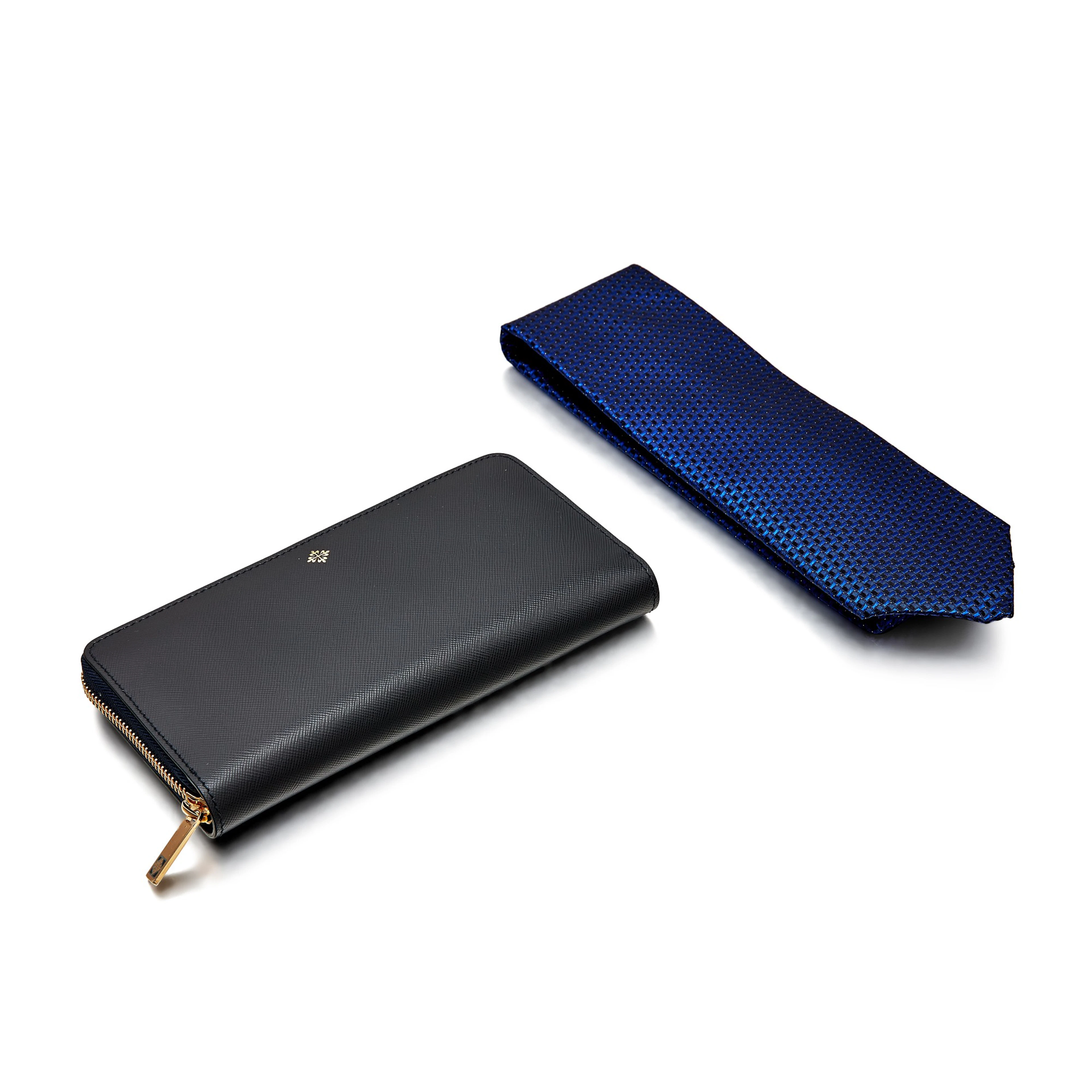 A set of two silk tie and leather wallet