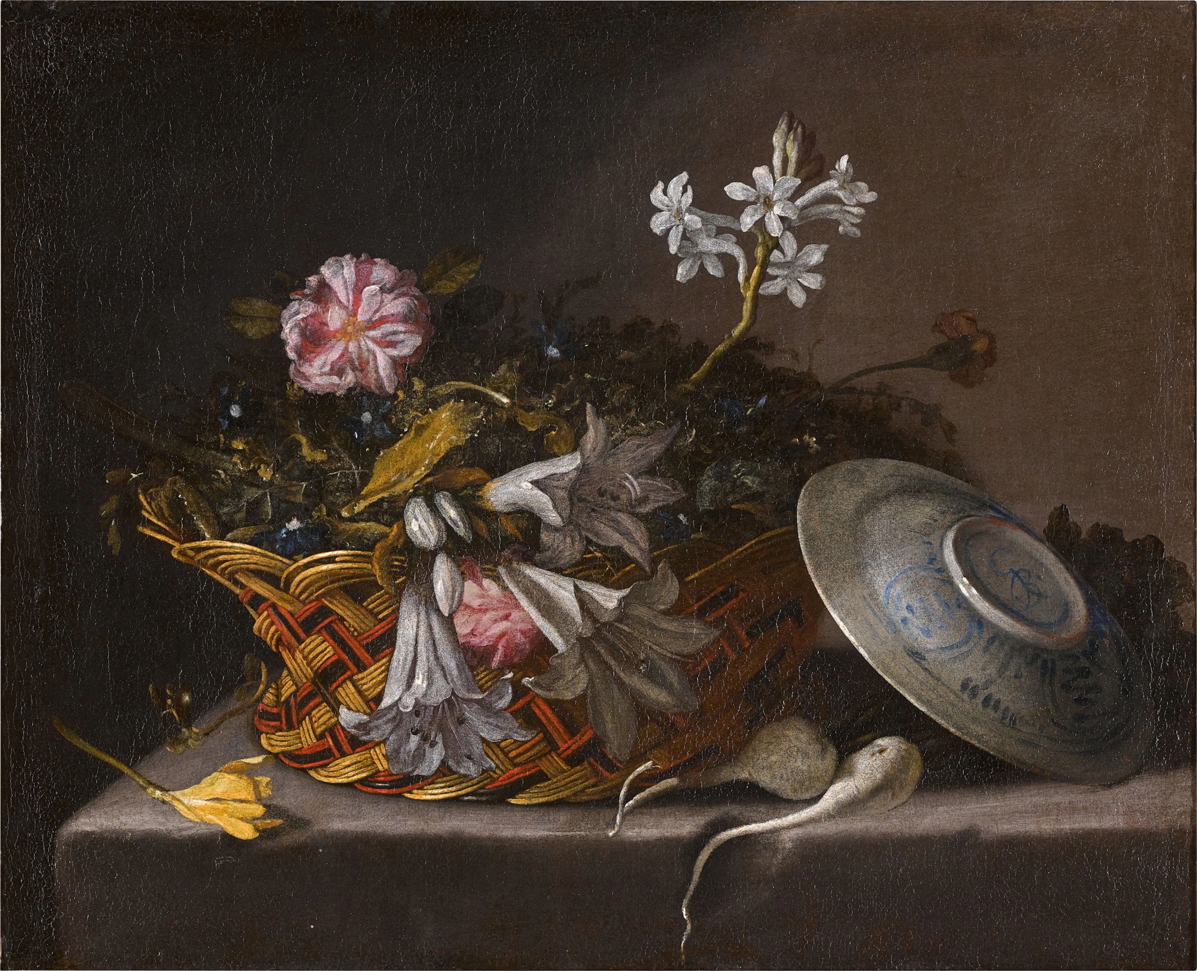 Still life of flowers in a wicker basket