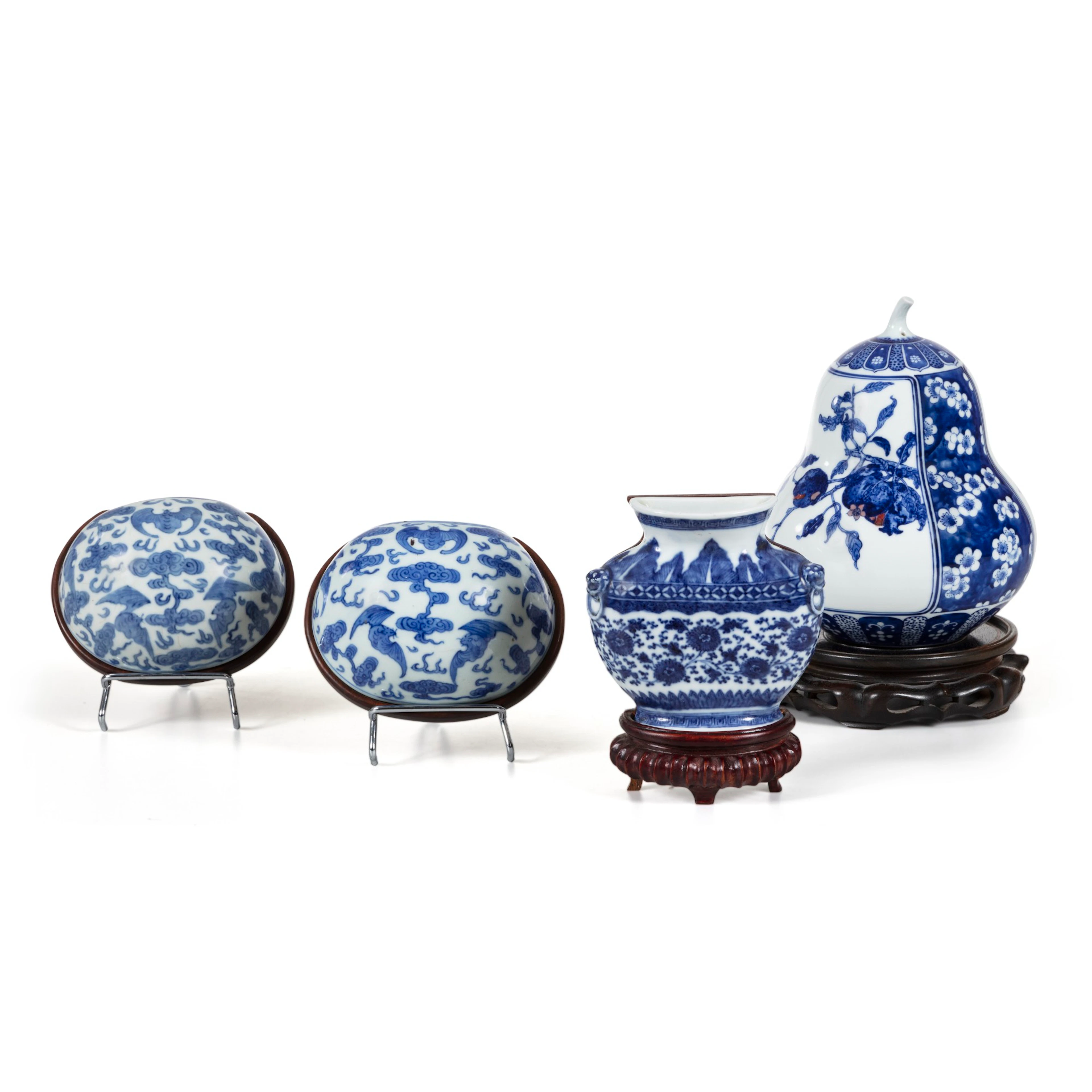 Three blue and white wall vases and a blue and white...