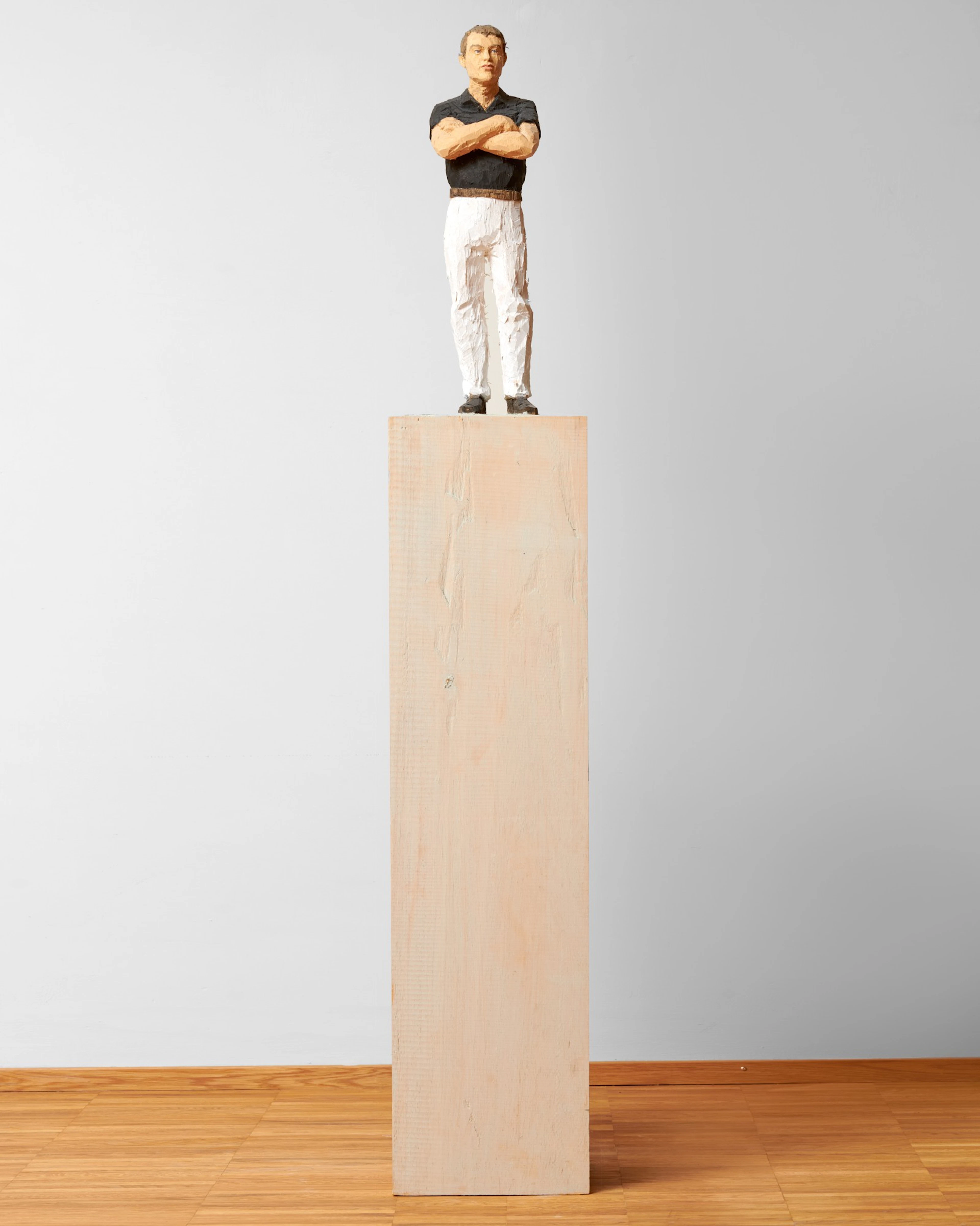 Untitled (Man with black t-shirt and white trousers)