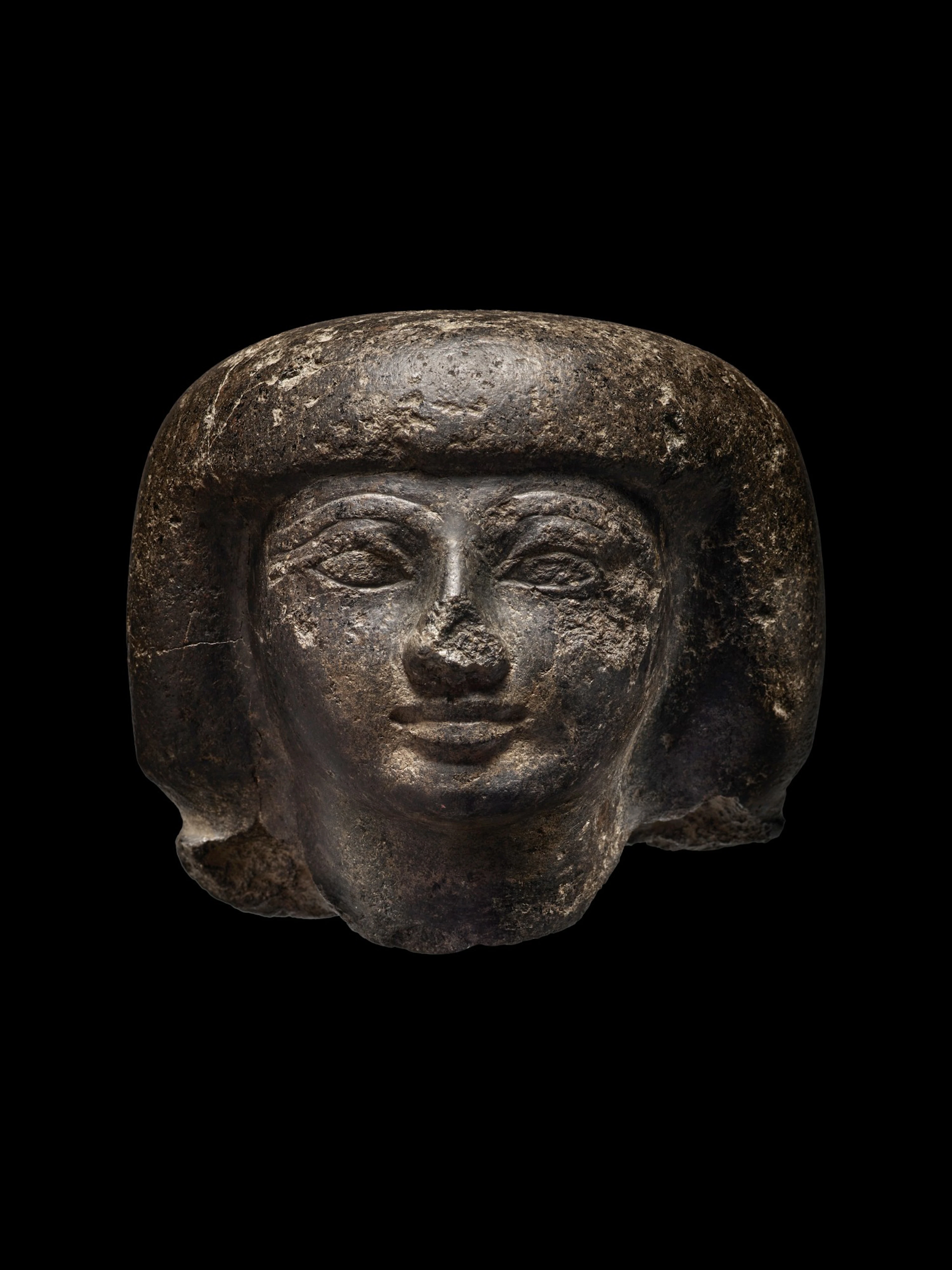 An Egyptian Granite head of a Man