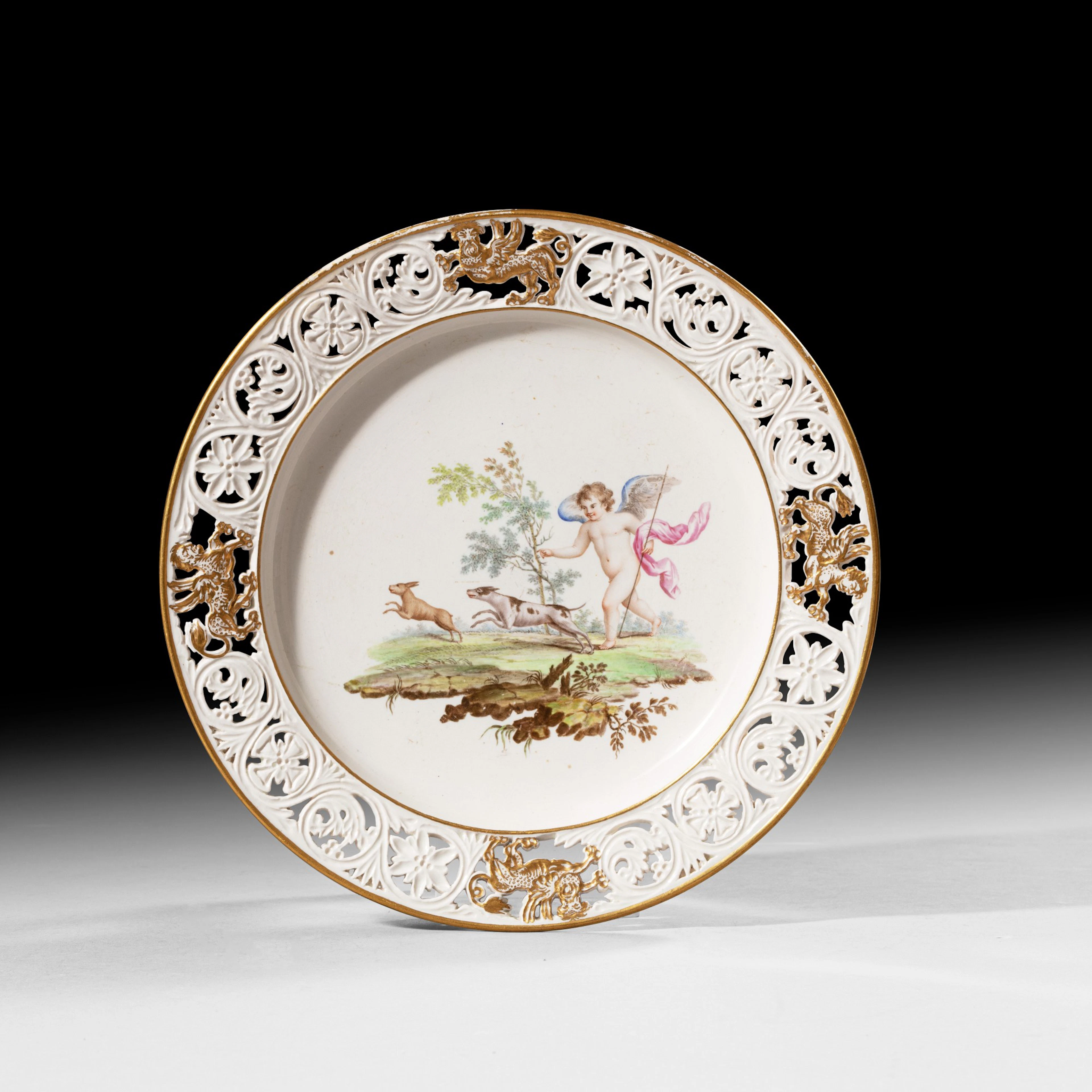A pierced porcelain dinner plate of the Real Fabbrica Ferdinadea