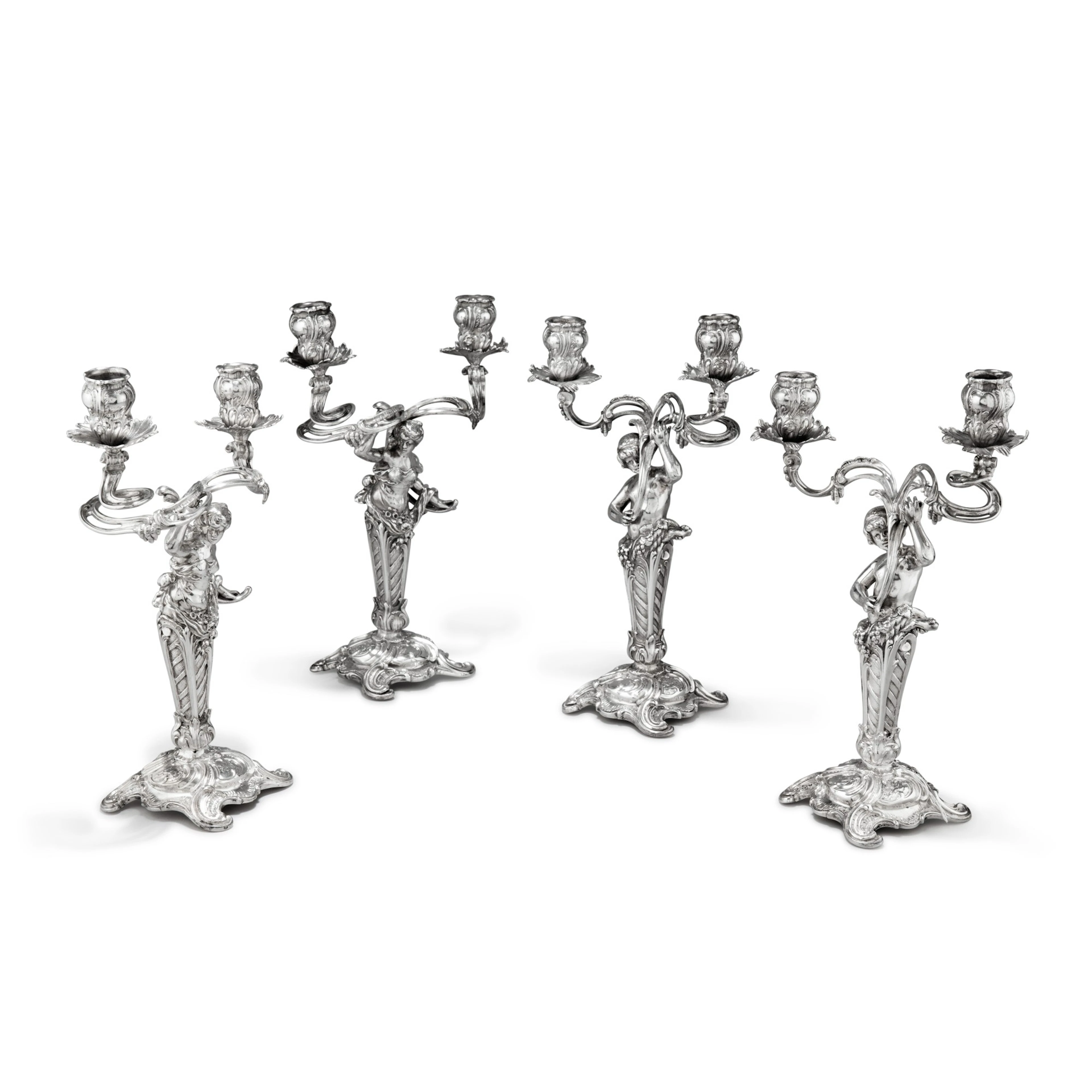 A German set of two pairs of two-light candlesticks
