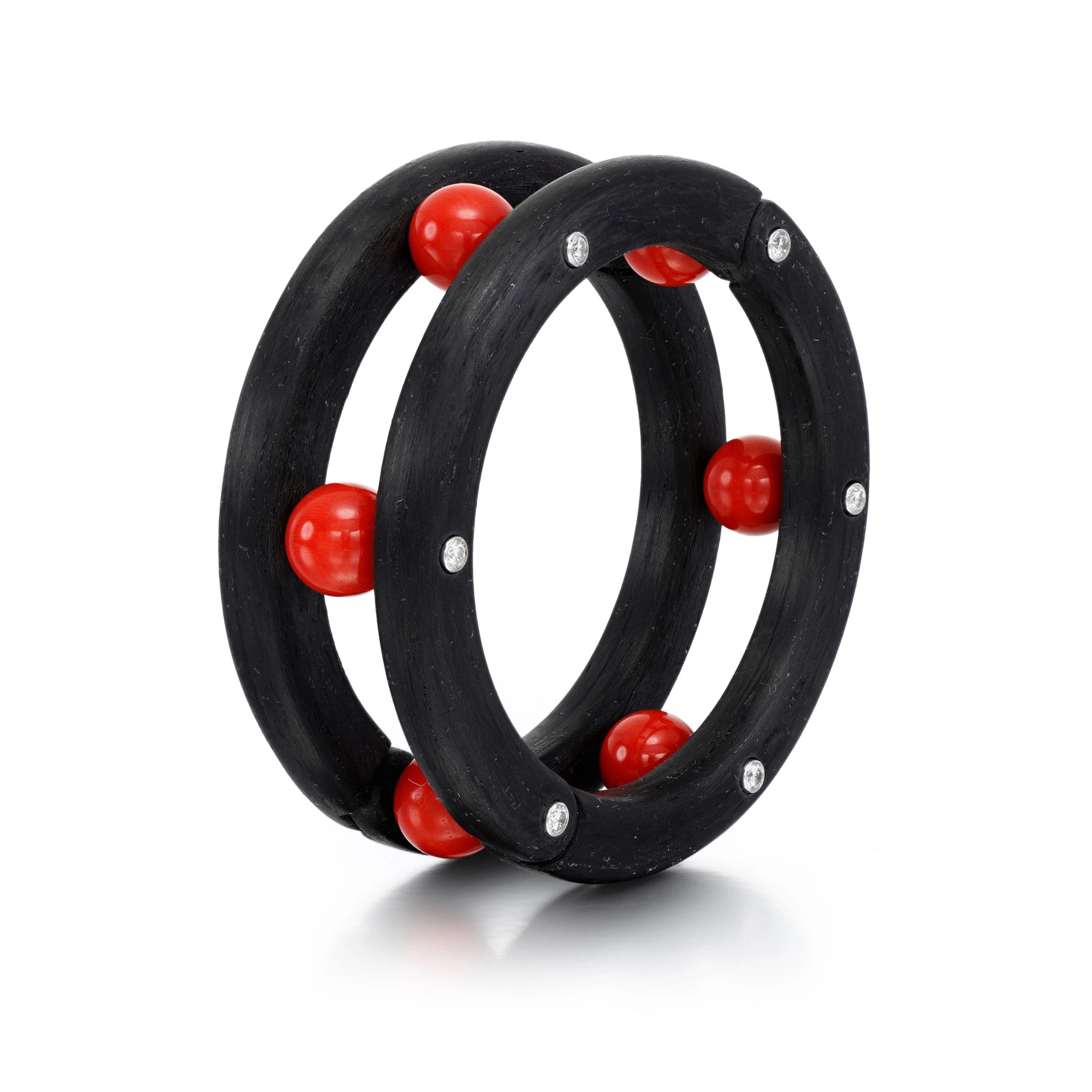 Carbon fibre, white gold, coral and diamond bracelet