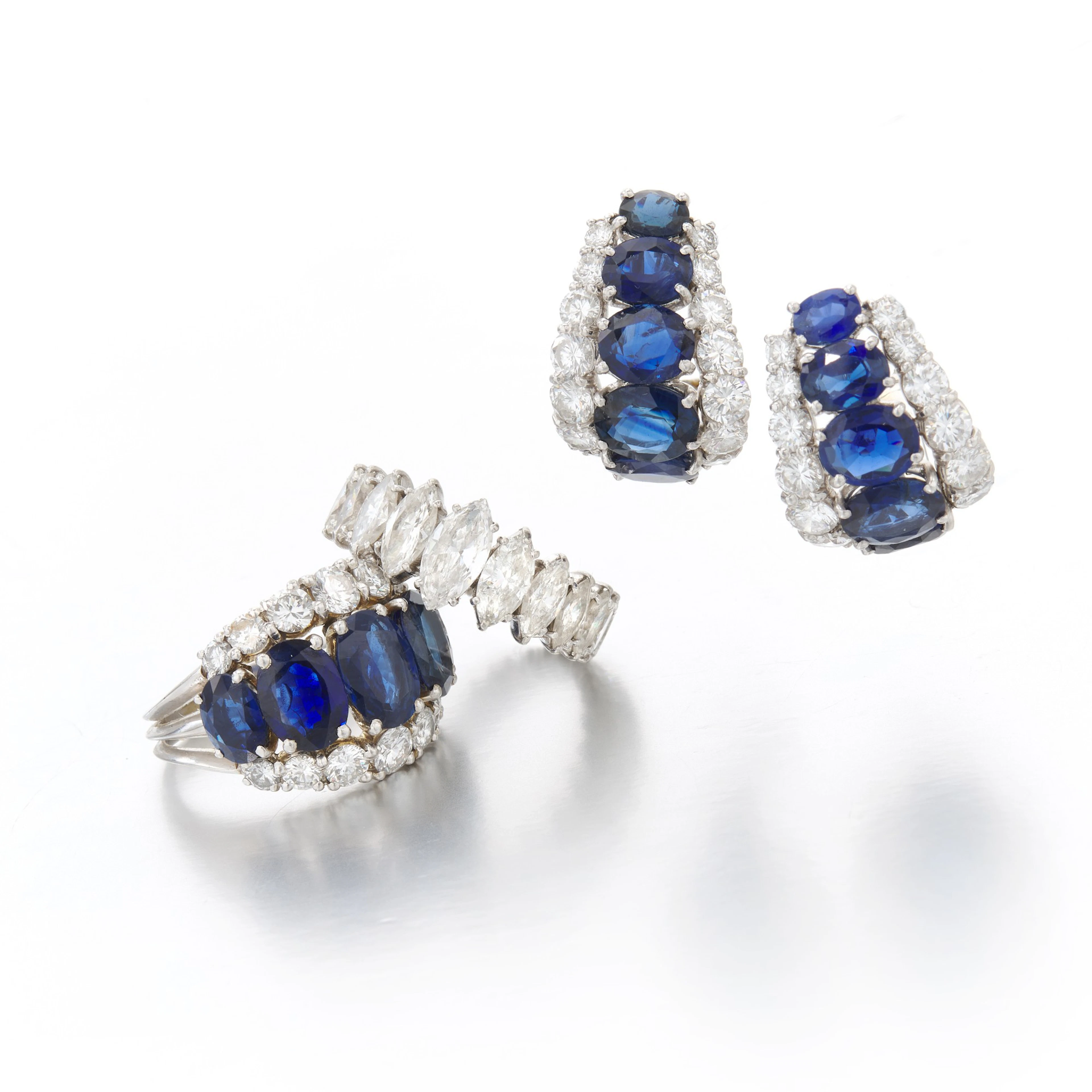 Sapphire and diamond ear clips and ring and a diamond...