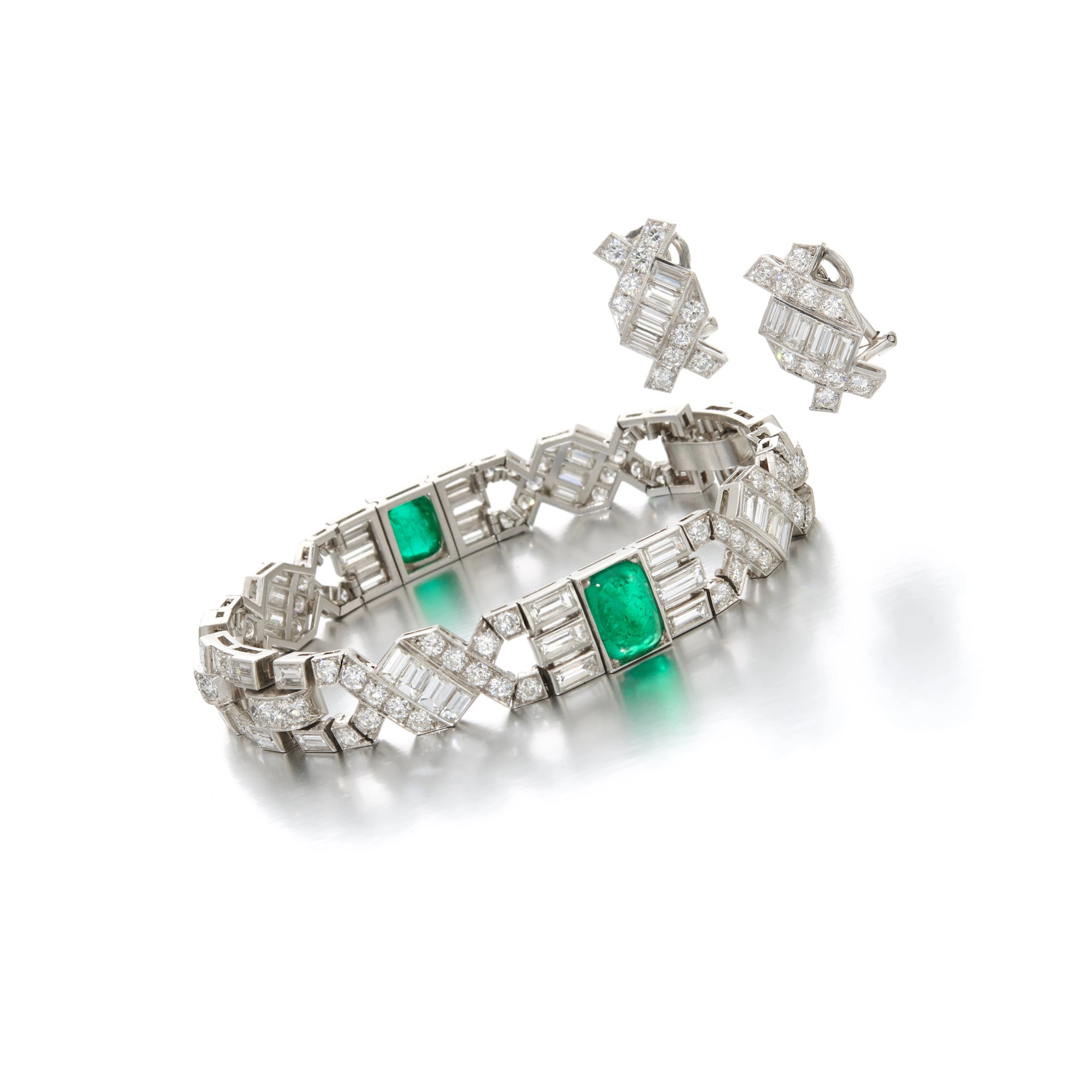 Emerald and diamond bracelet and a pair of earrings...