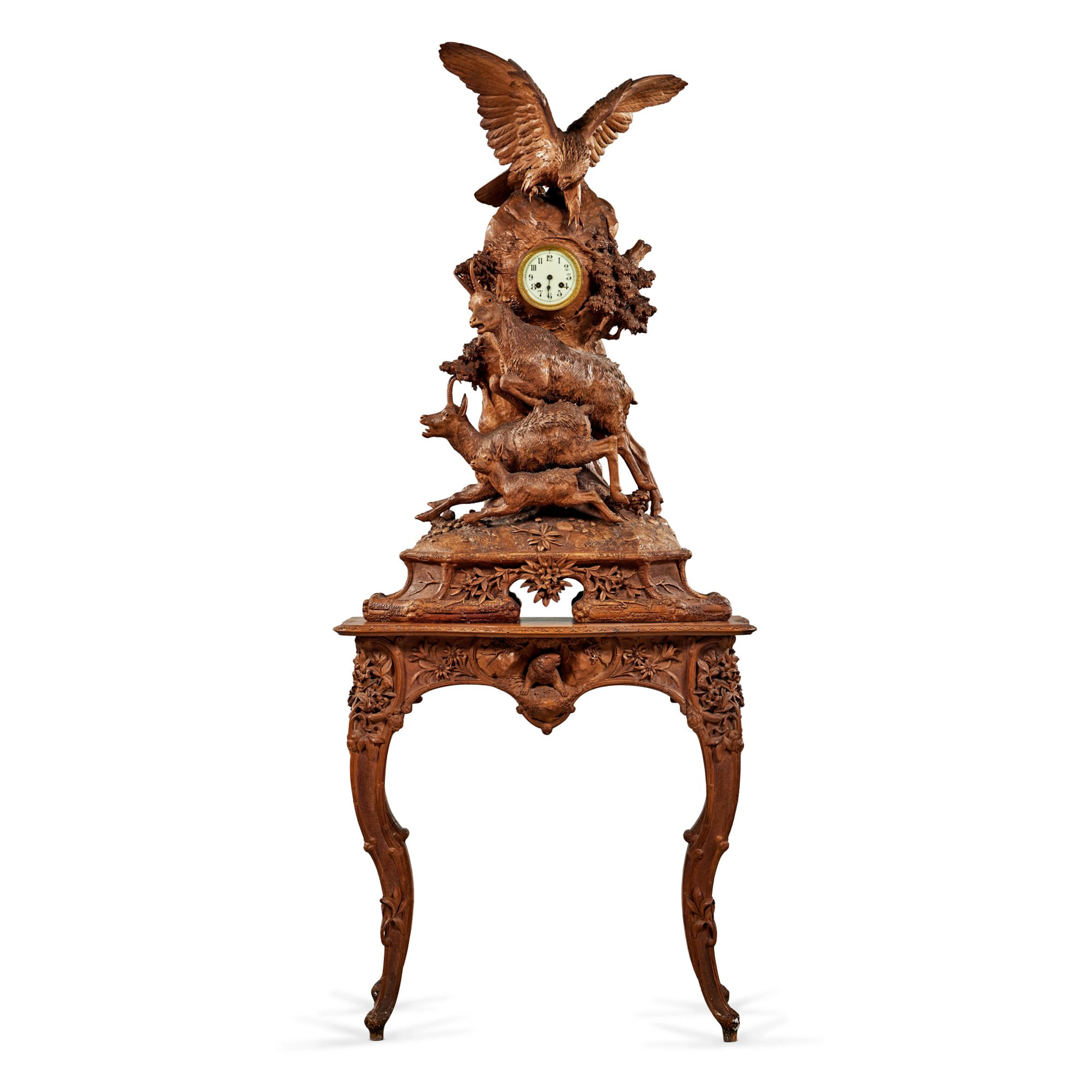 A Swiss Black Forest Carved Lindenwood Figural Clock , Circa 1880