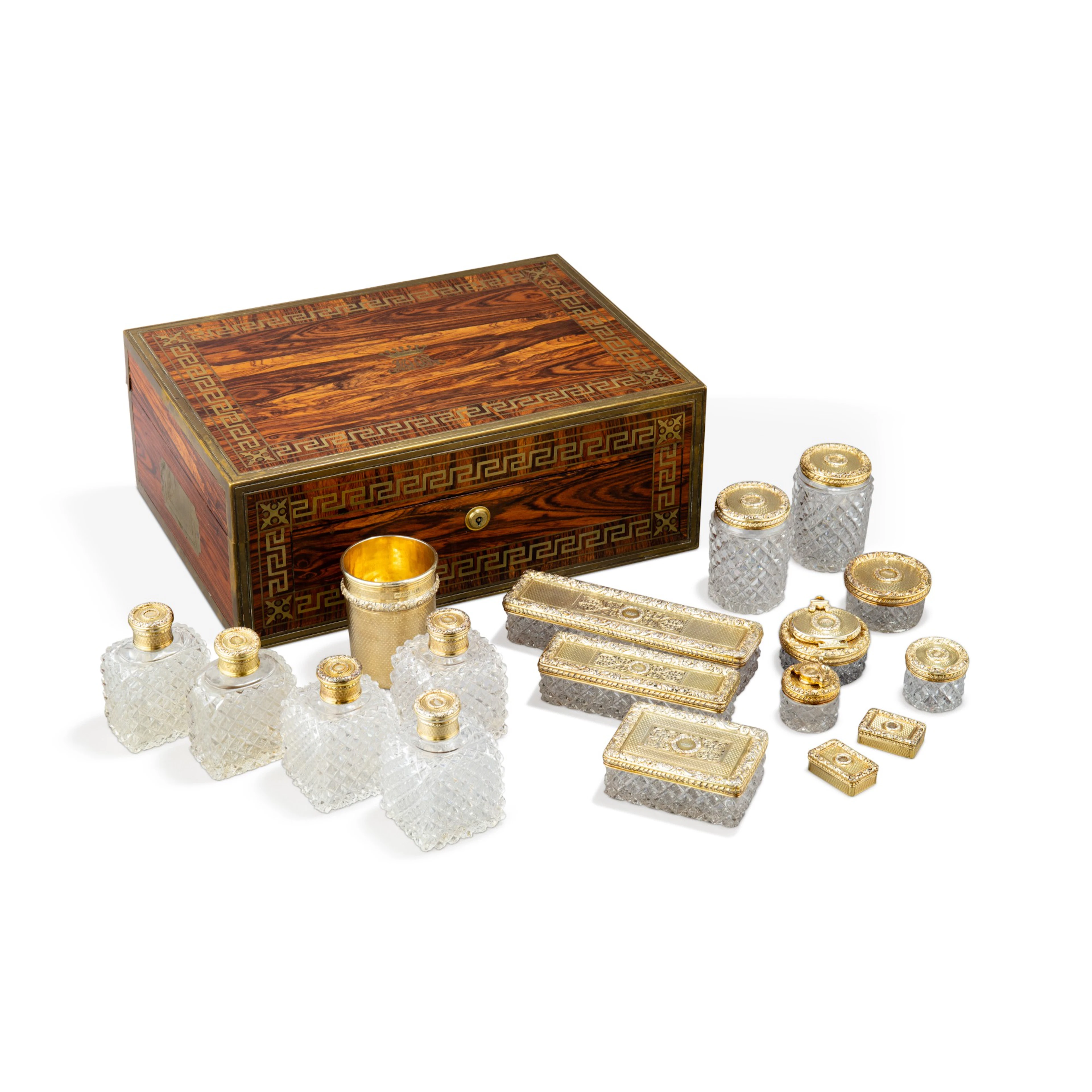 A George IV silver-gilt toilet travelling set