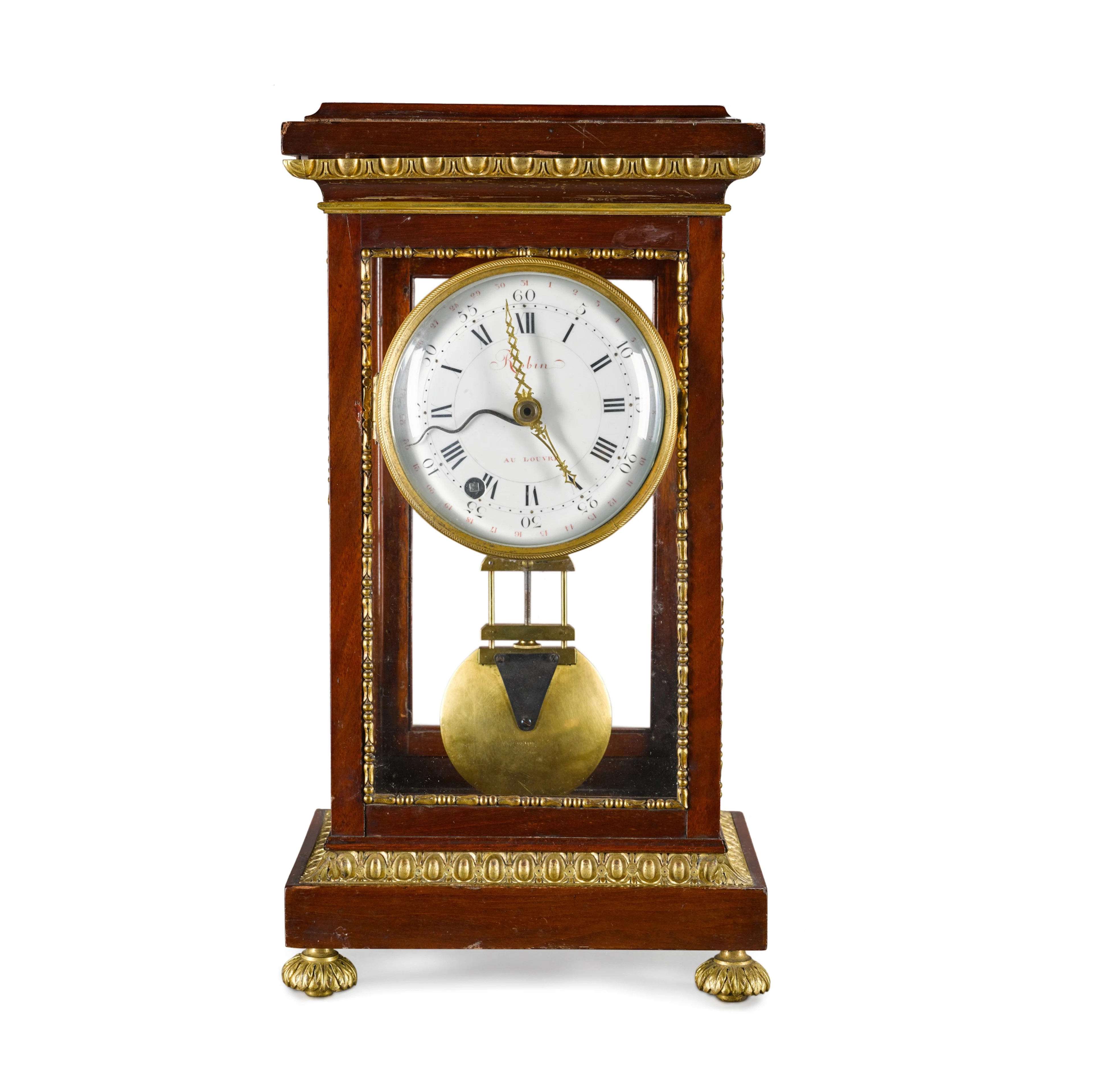 A Louis XVI gilt-mounted mahogany table regulator