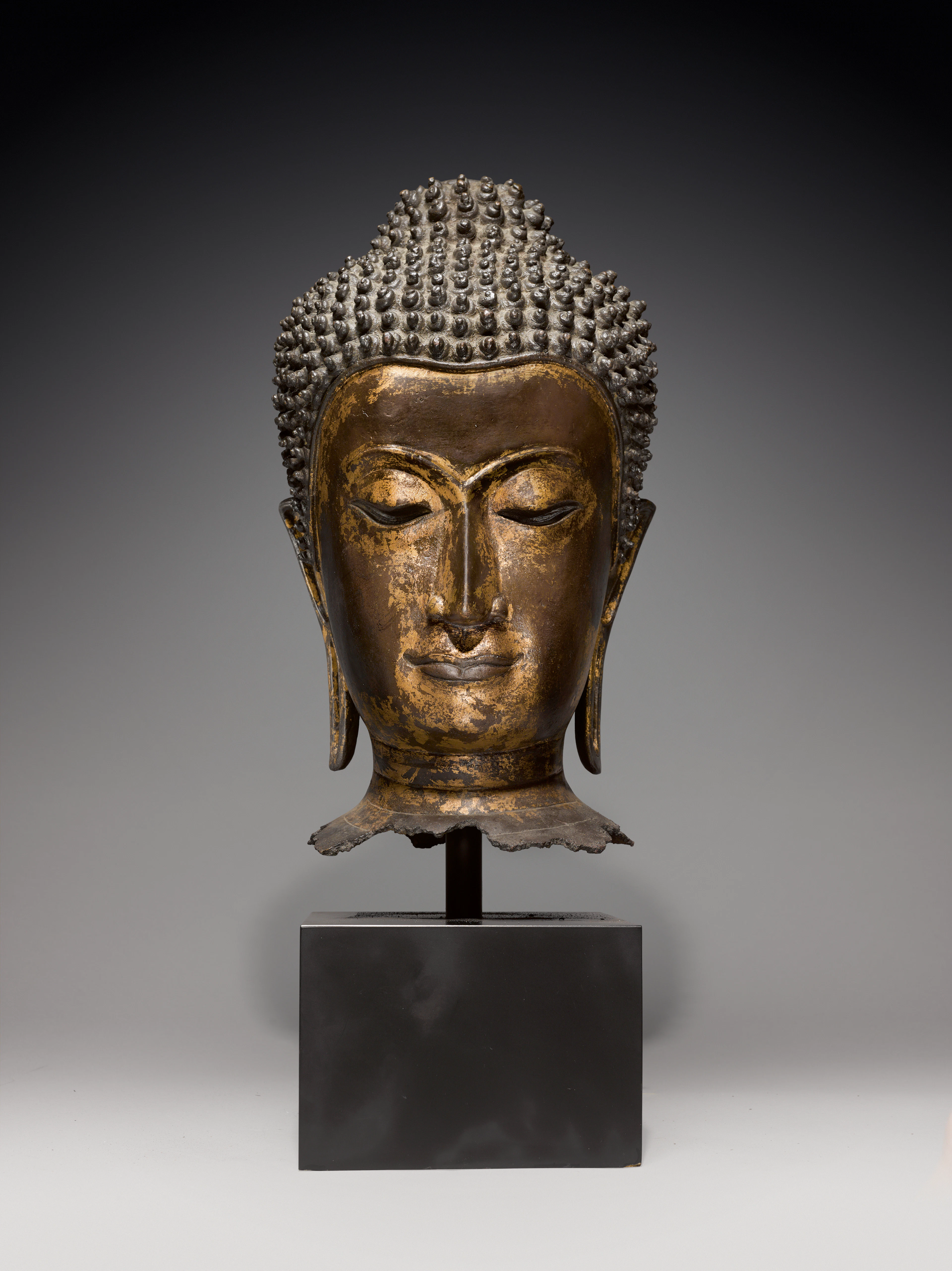 A gilt-copper alloy head of Buddha Ayutthaya style