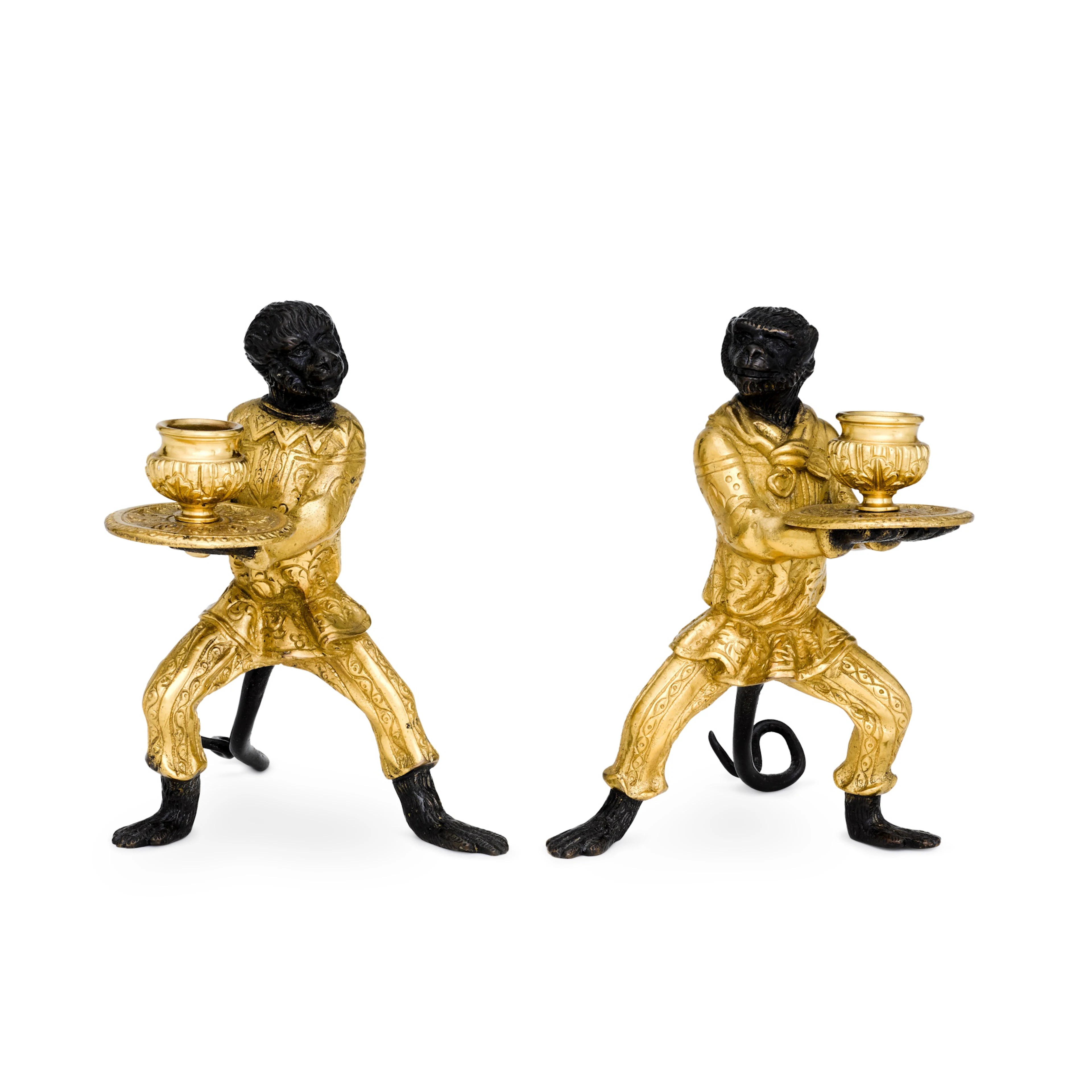 A pair of gilt and patinated bronze singerie candelsticks, 20th century