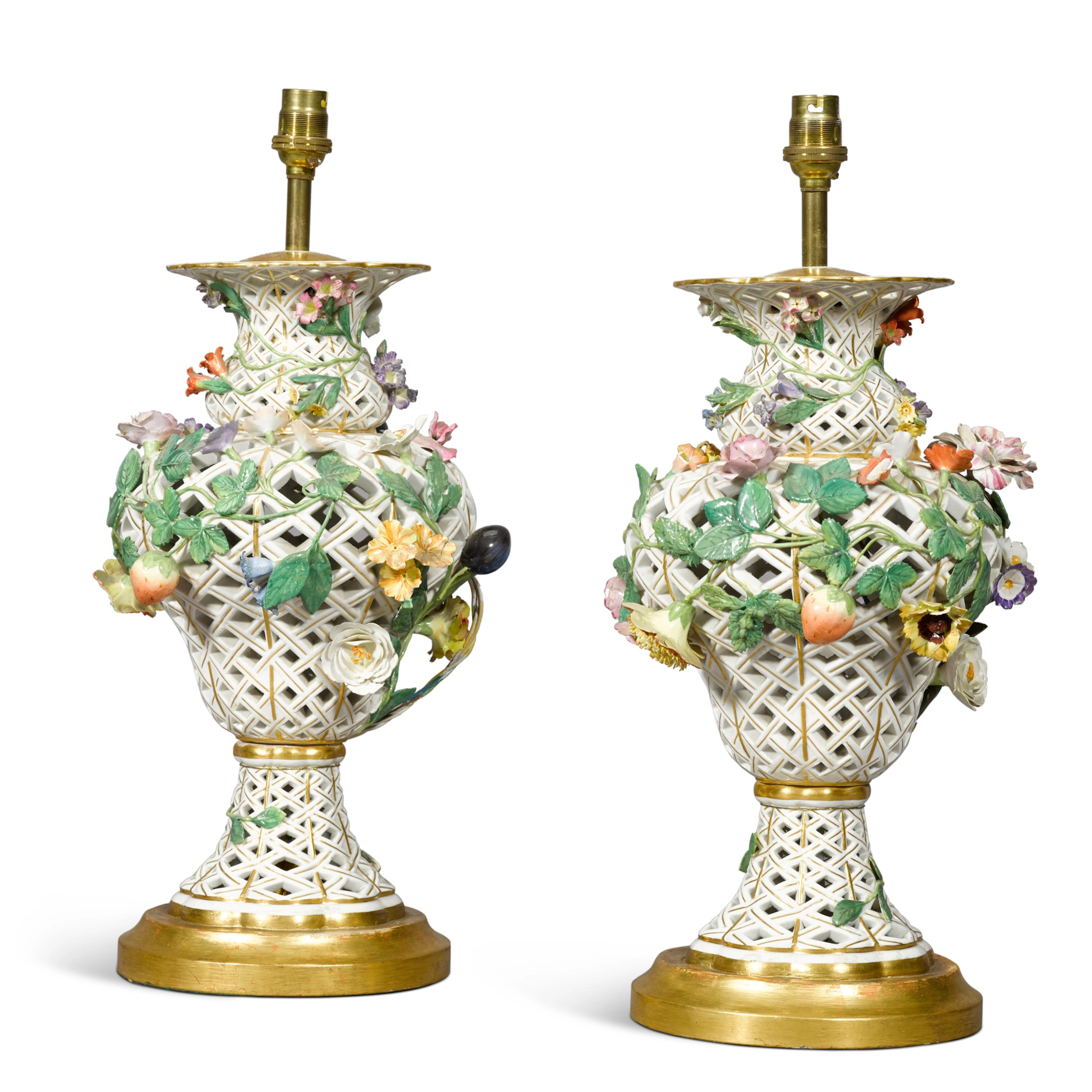 A pair of German porcelain table lamps