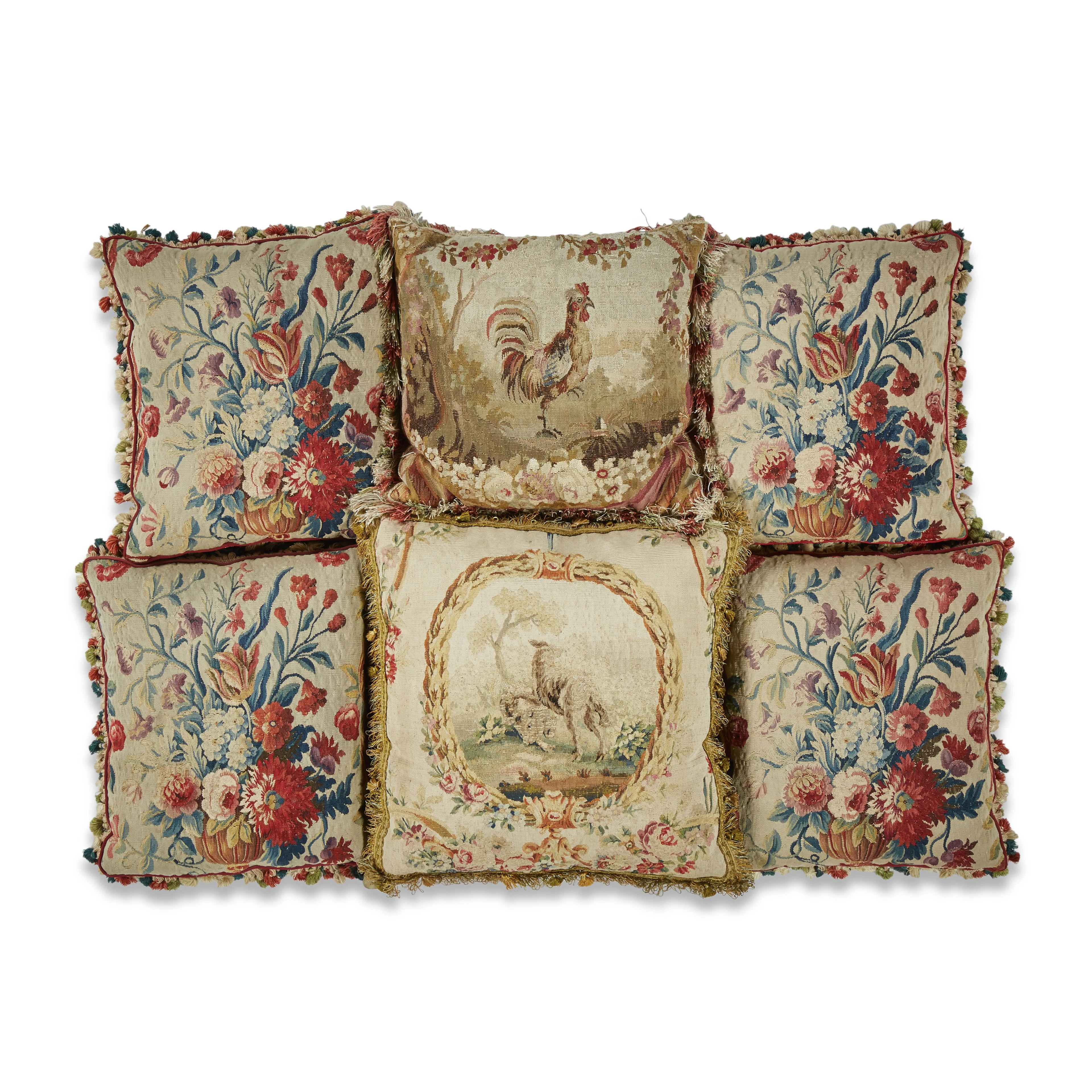 An assembled group of six tapestry cushions, 18th century and later