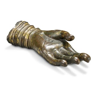 A large gilt-bronze hand of a buddha