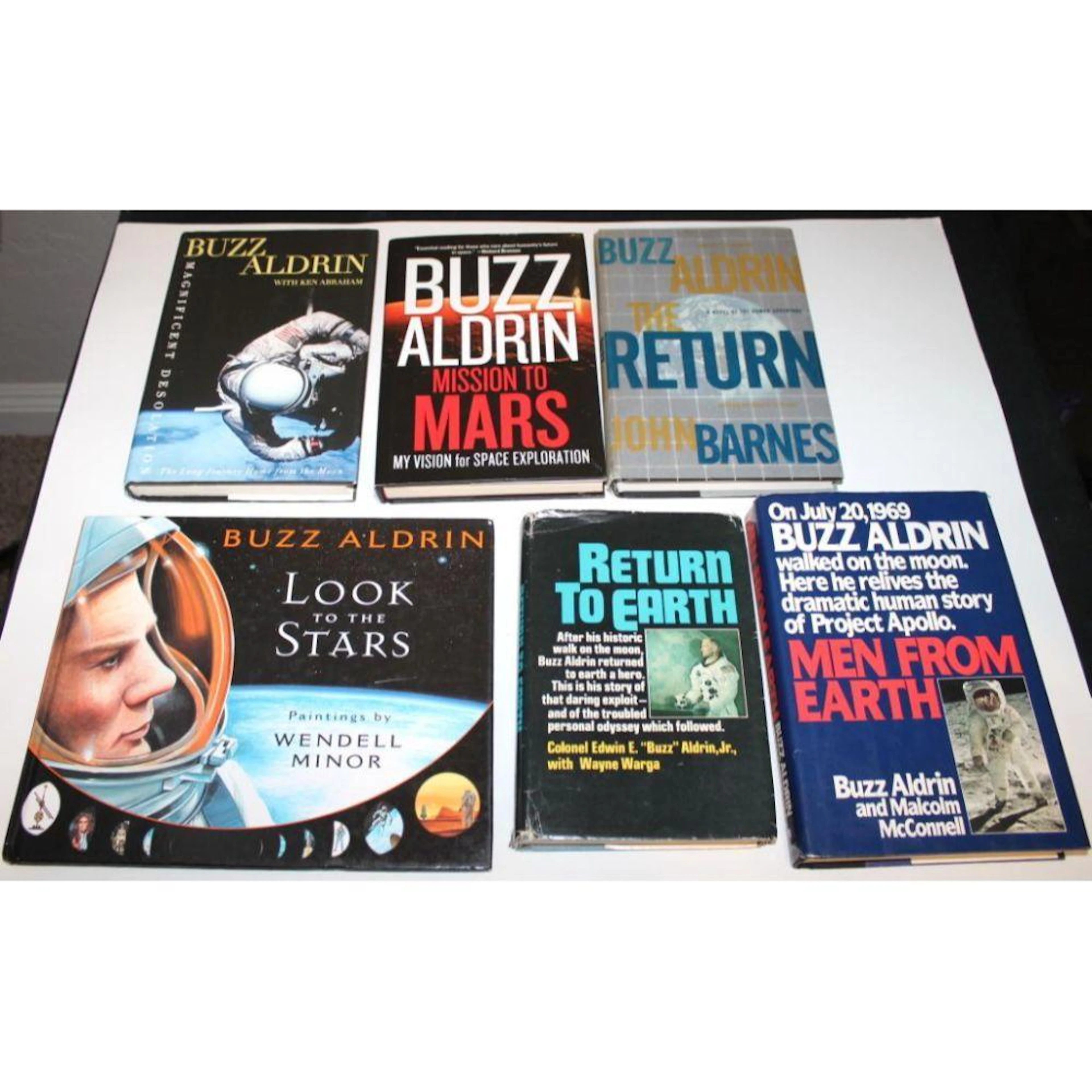 Group of Six Buzz Aldrin Authored Hardbound Books