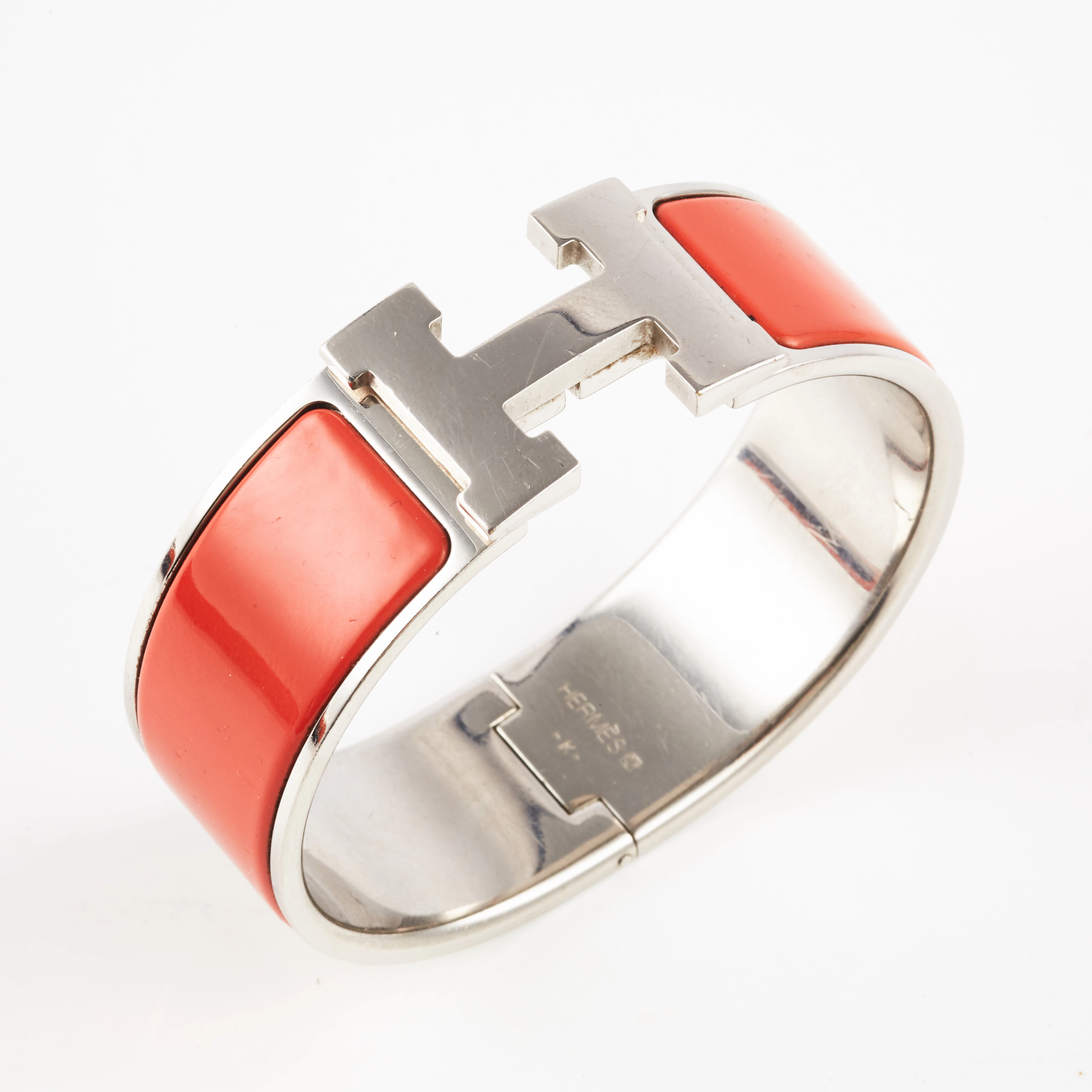 Hermes armband Clic H med röd emalj på metall