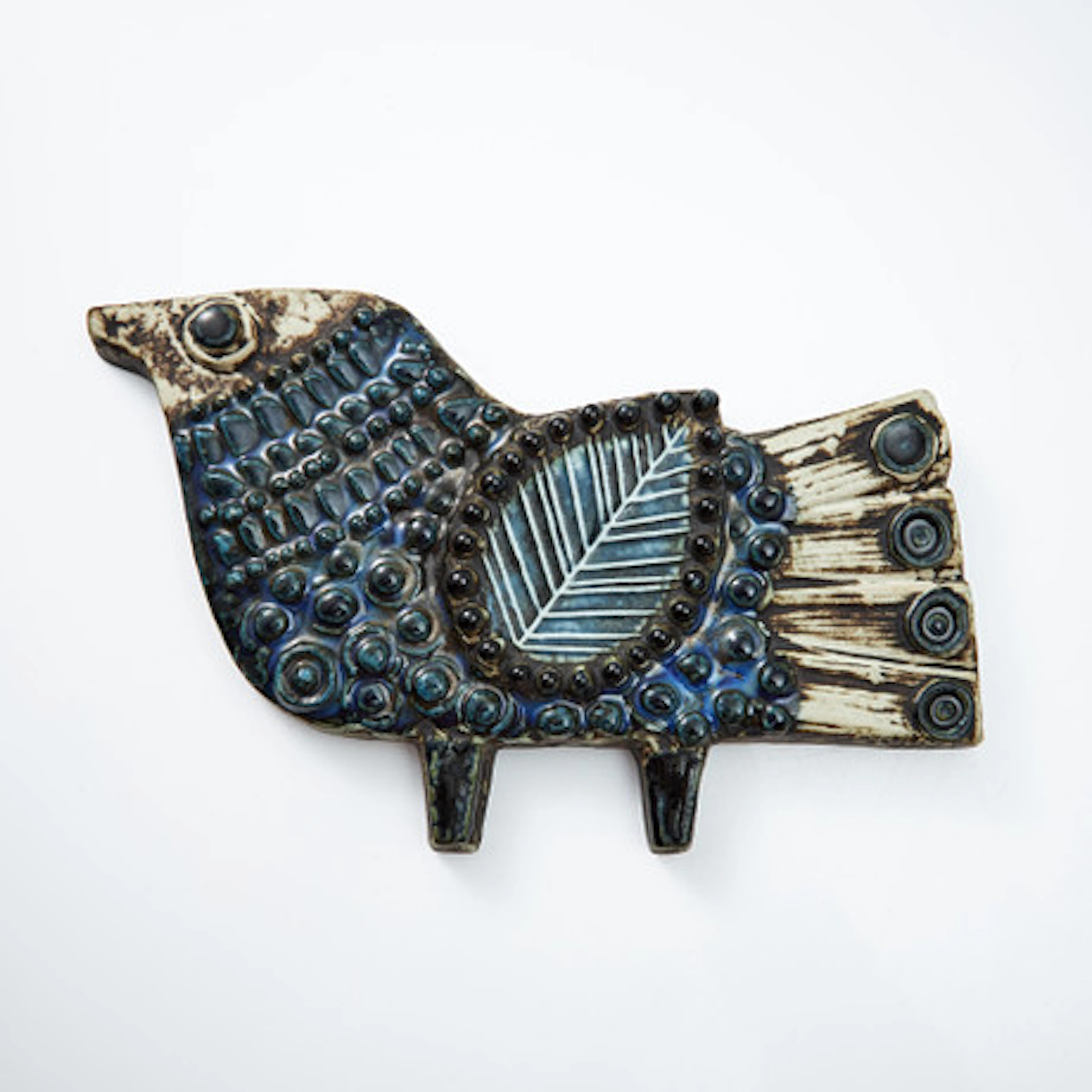 LISA LARSON. Relief, i form av fågel, sten…