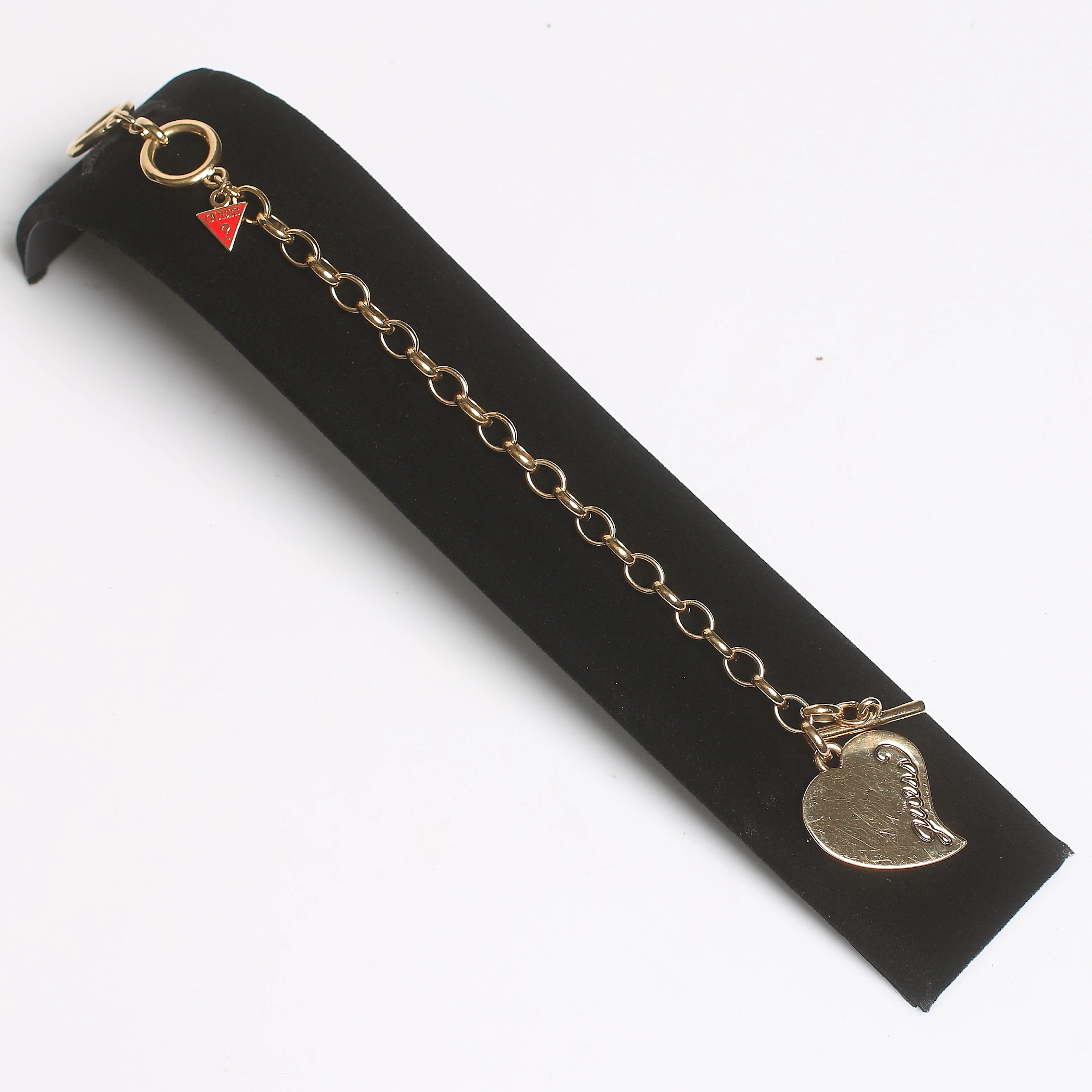 COLLIER, ARMBAND samt ÖRHÄNGEN, gulmetall samt strass, GUESS, 1900/2000-tal.