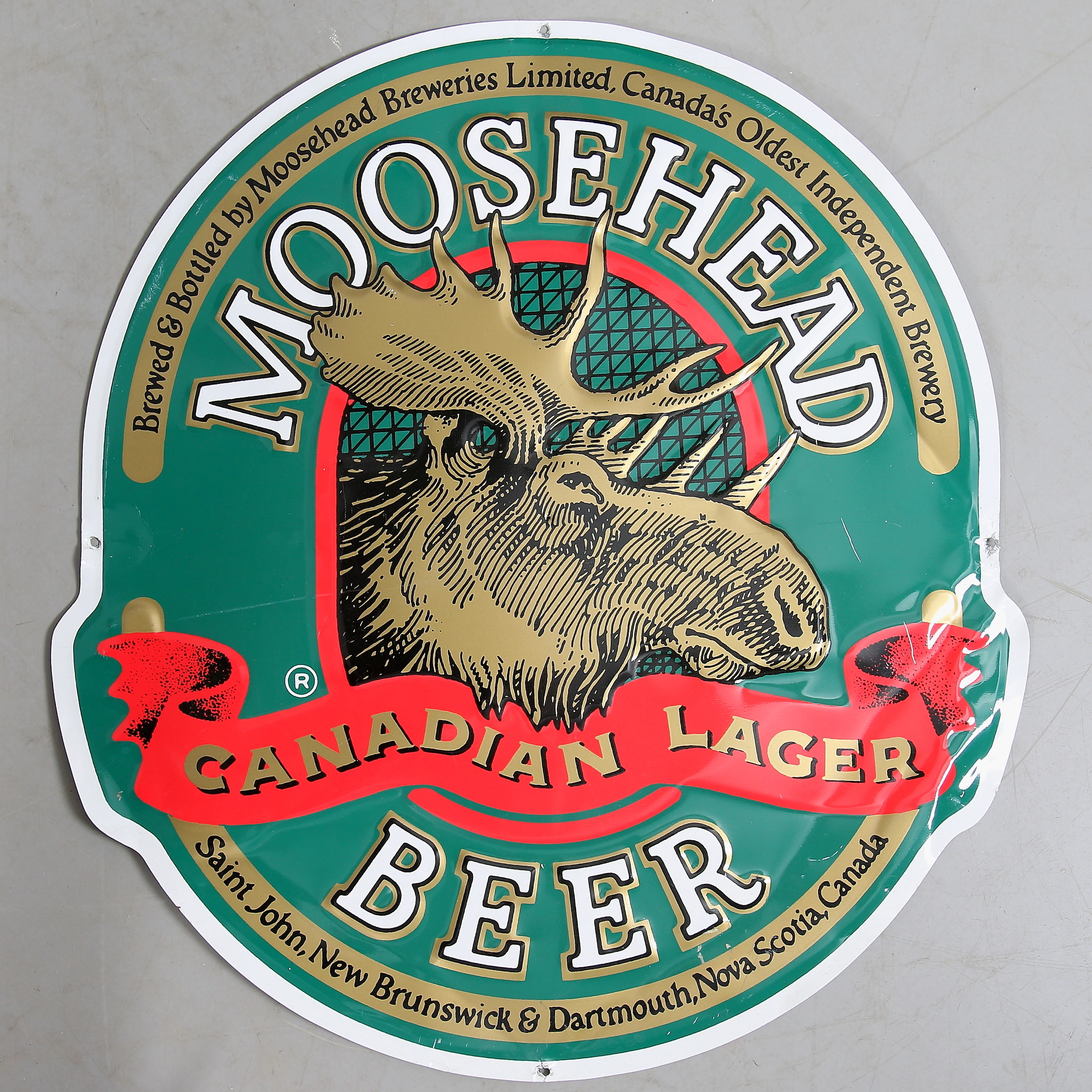 REKLAMSKYLT, plåt, Moosehead Beer, 1900-talets senare del.