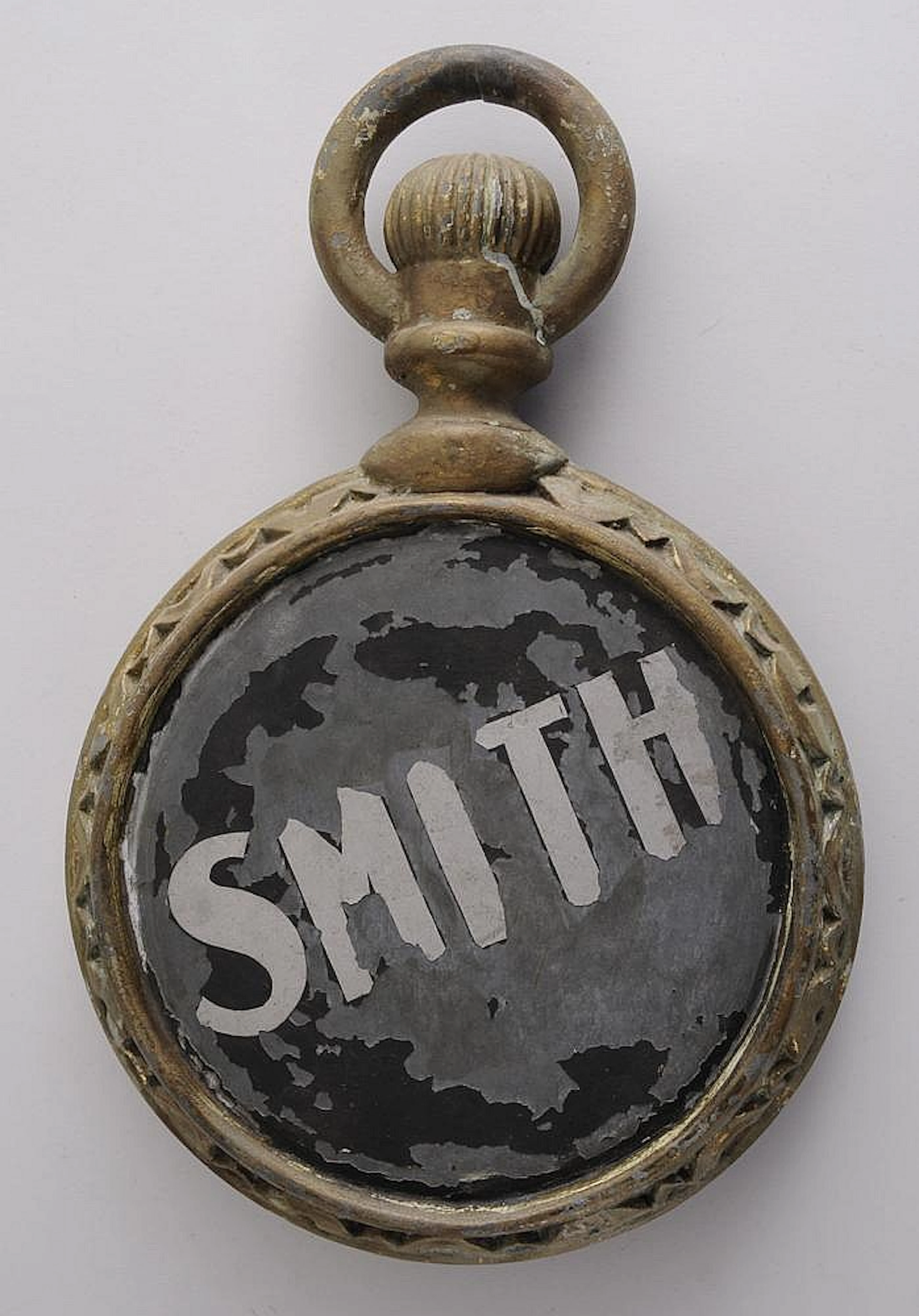 AMERICAN PAINTED CAST AND SHEET-METAL POCKET WATCH-FORM TRADE SIGN