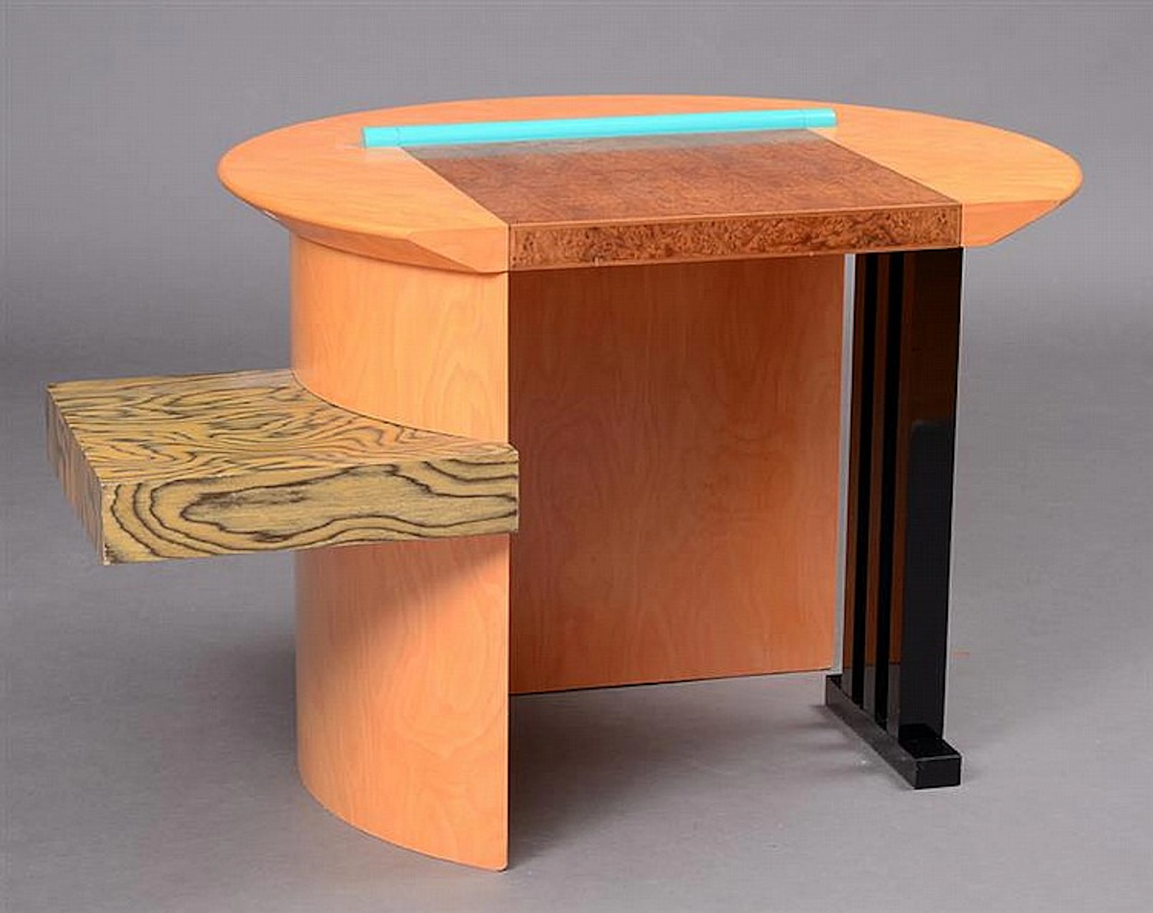 MEMPHIS LACQUER AND FAUX-WOOD DESK: SOPHIA, DESIGNED BY ALDO CIBIC, CIRCA 1985