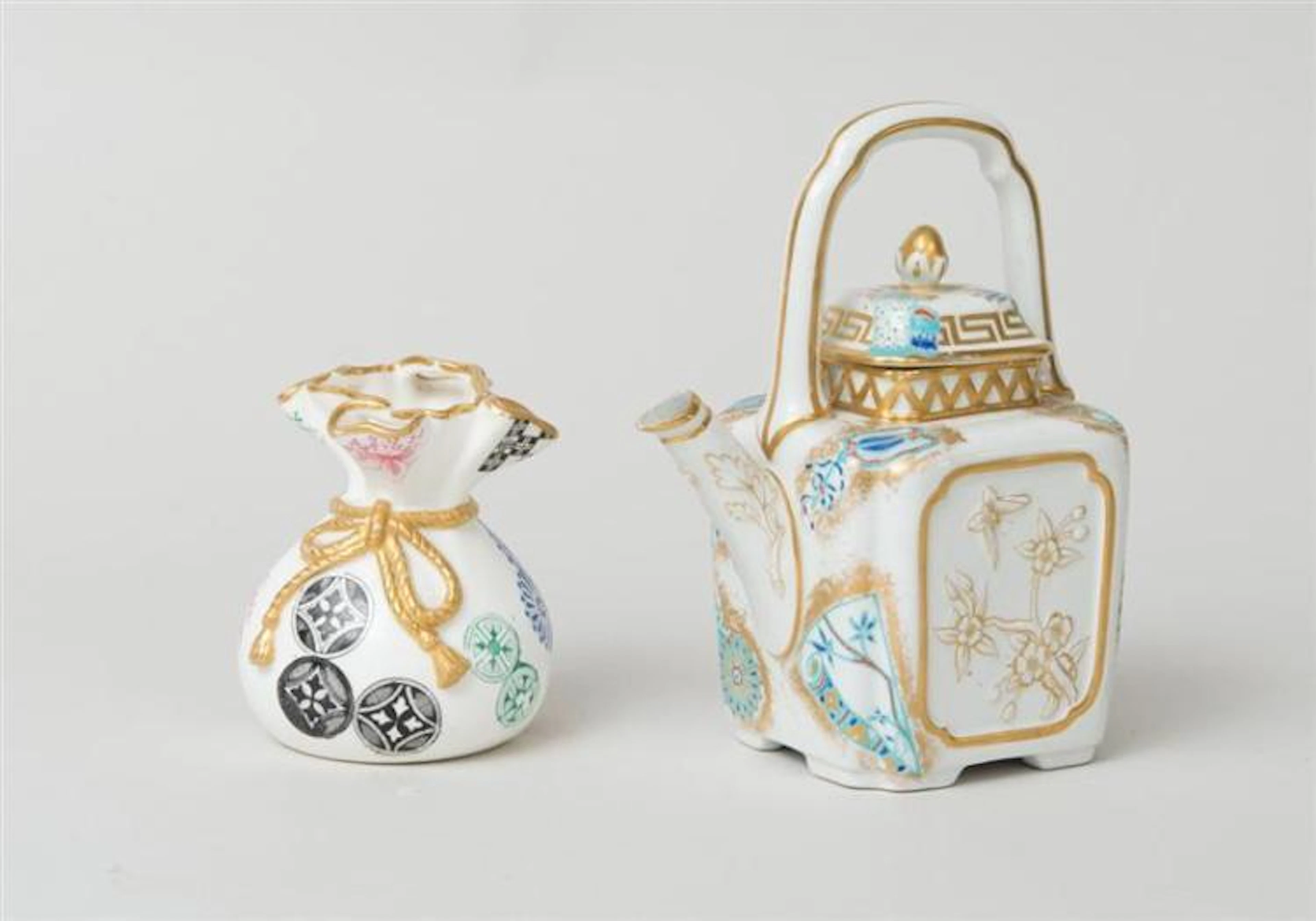 ROYAL WORCESTER JAPONISM TEAPOT AND COVER, AND A MODEL OF A MONEY SACK