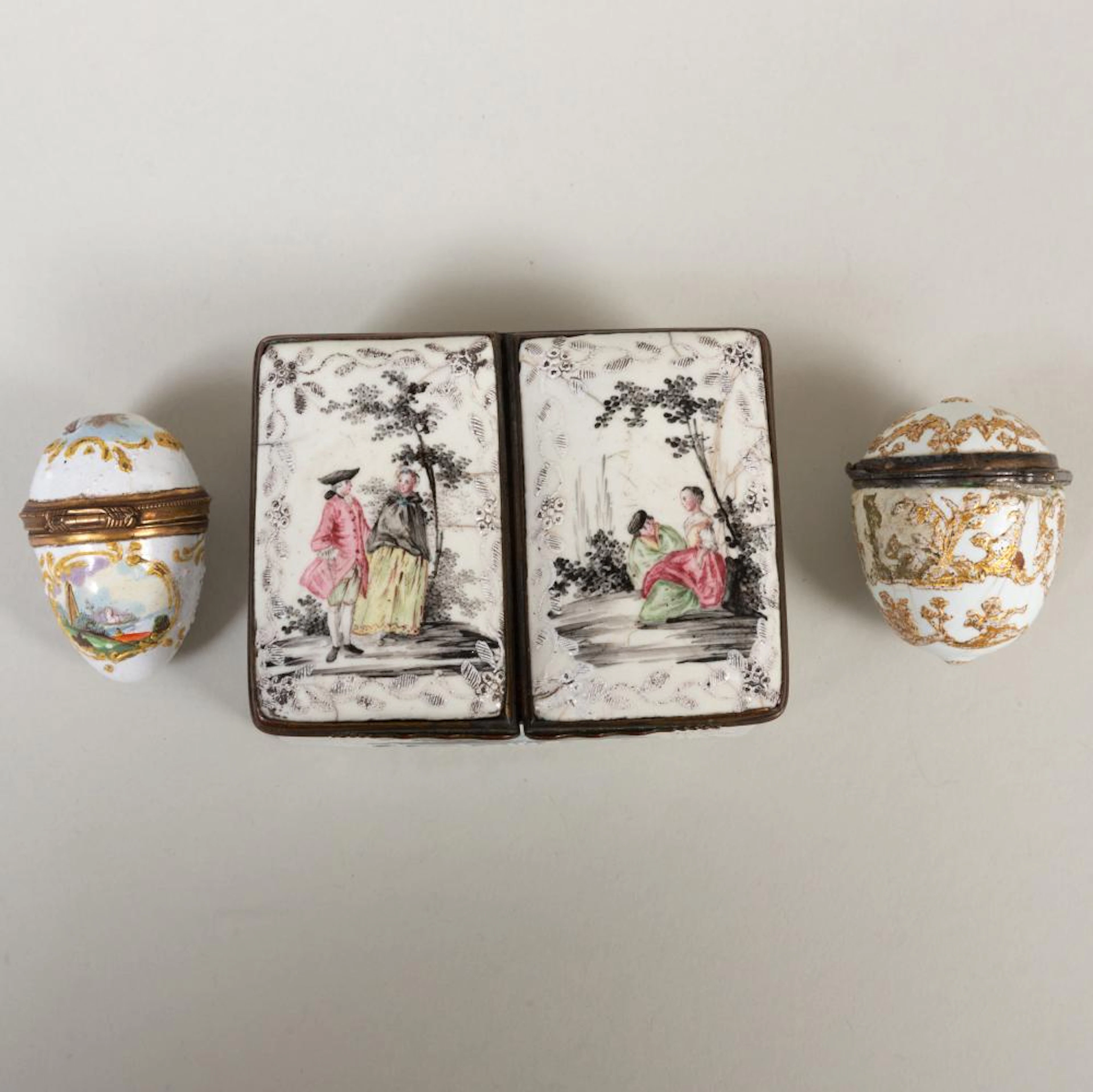 Group of Three English White Ground Enamel Boxes