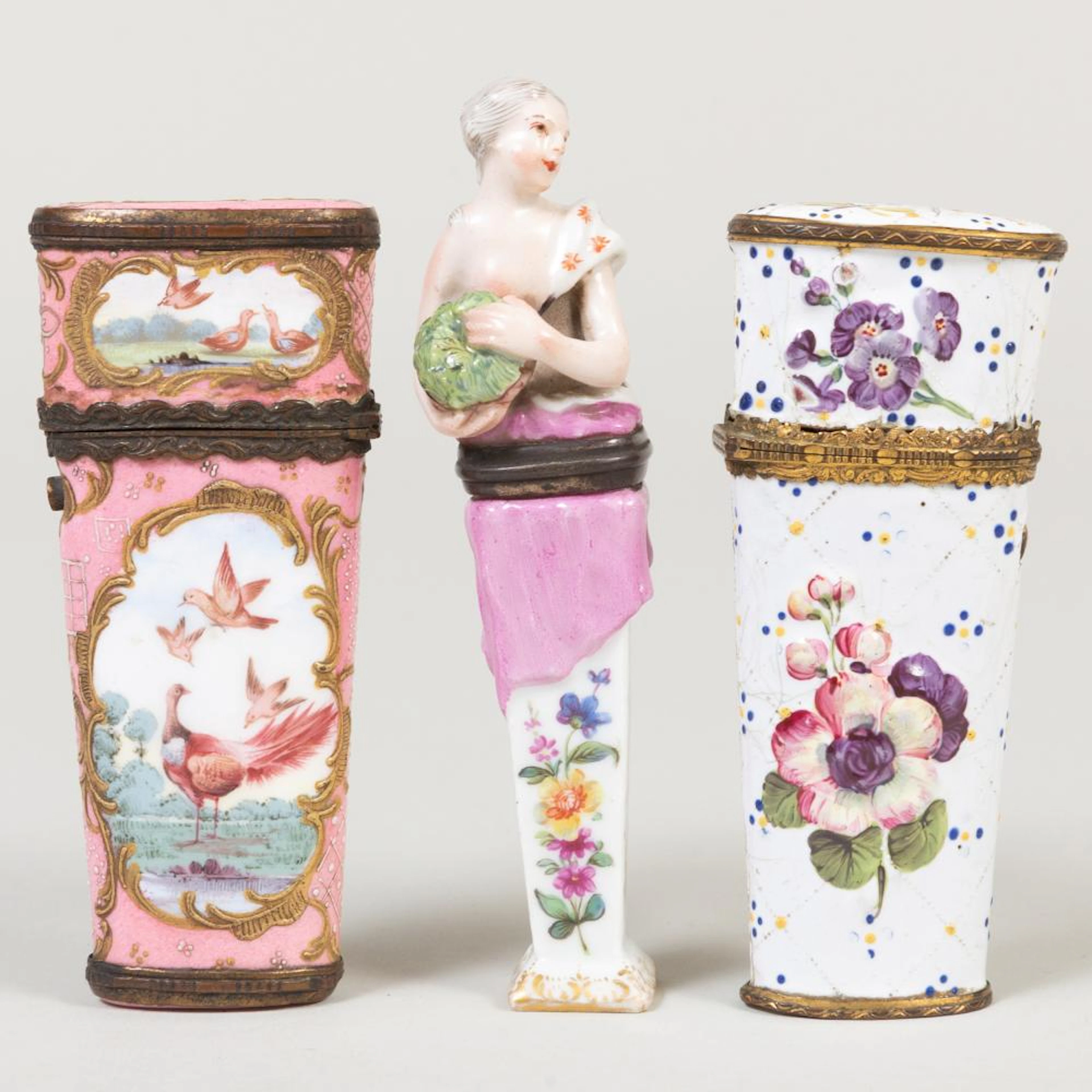 Two English Enamel Etui Cases and a Continental Porcelain Figural Snuff Box