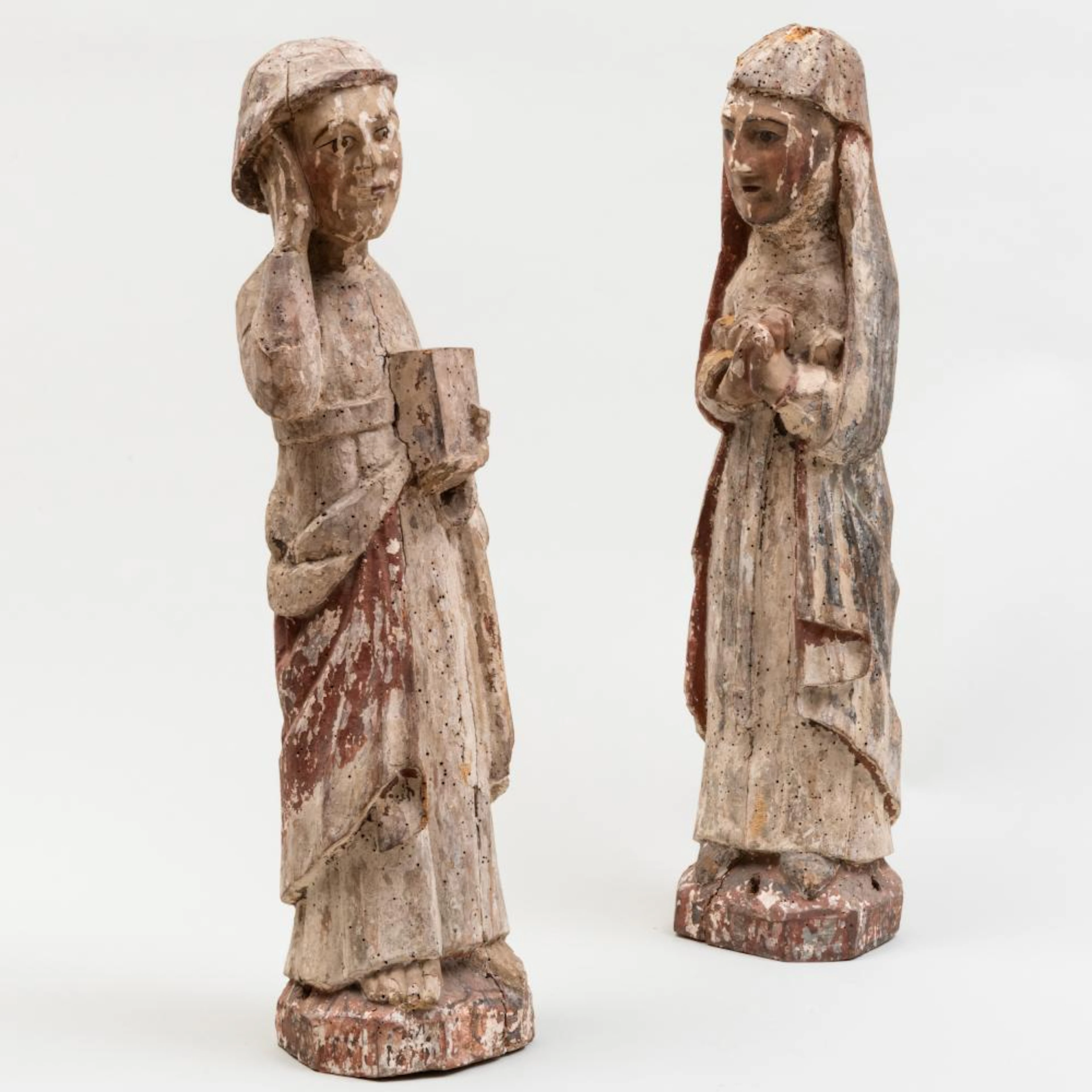 Two Polychromed Wood Figures of the Virgin Mary and a Saint