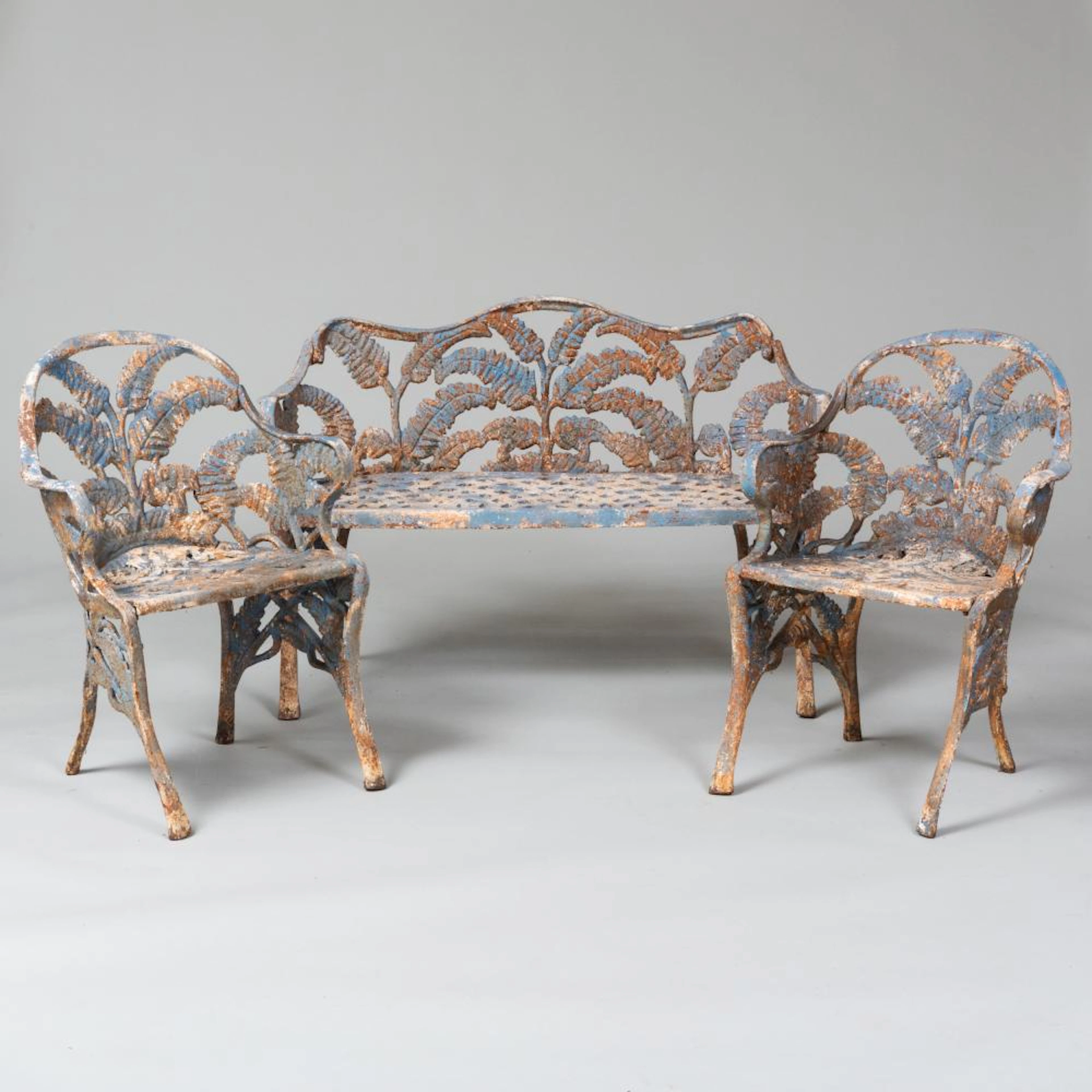 Diminutive Suite of Painted Cast Iron Fern Pattern Garden Seats