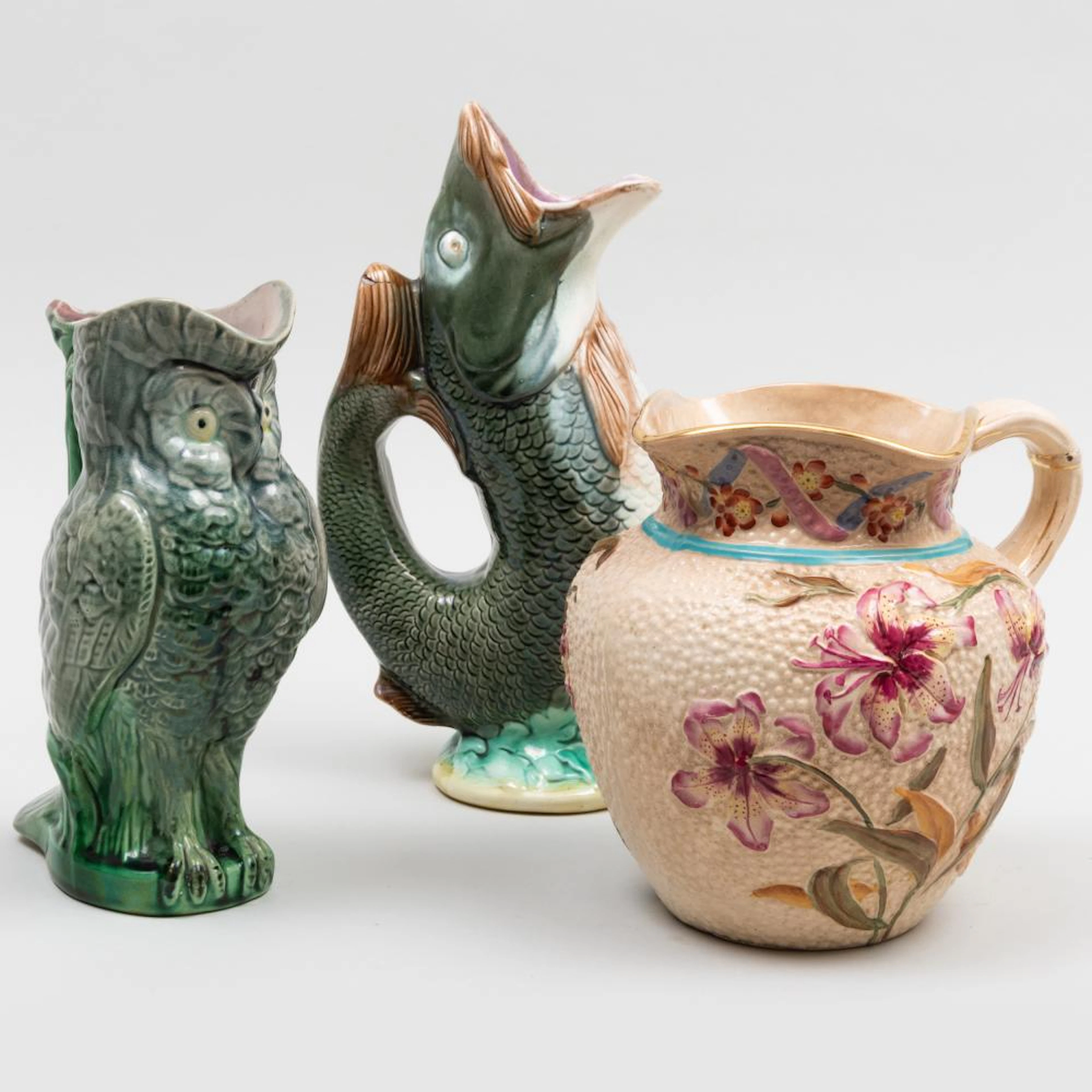 Group of Three Majolica Pitchers