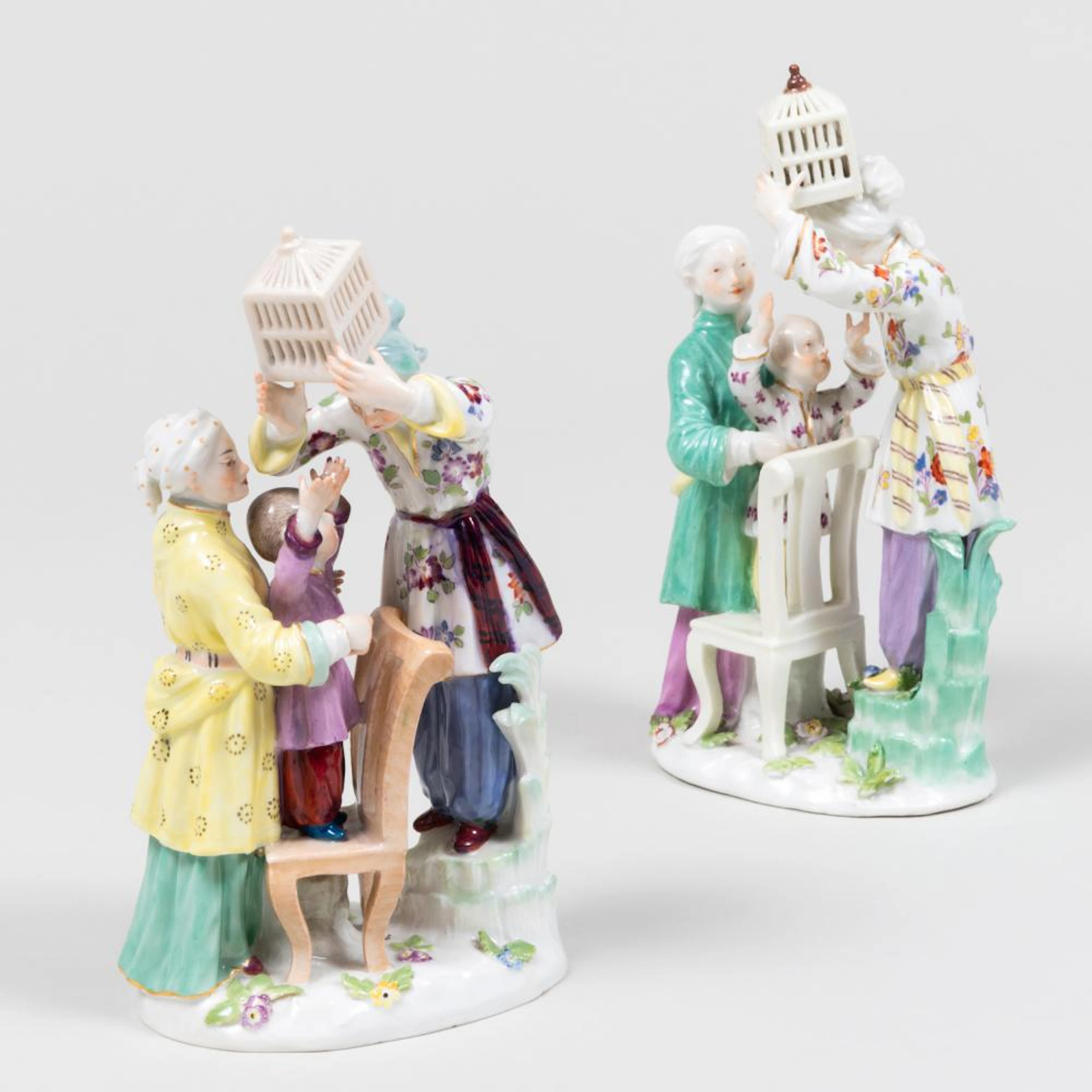 Two Meissen Chinoiserie Birdcage Groups