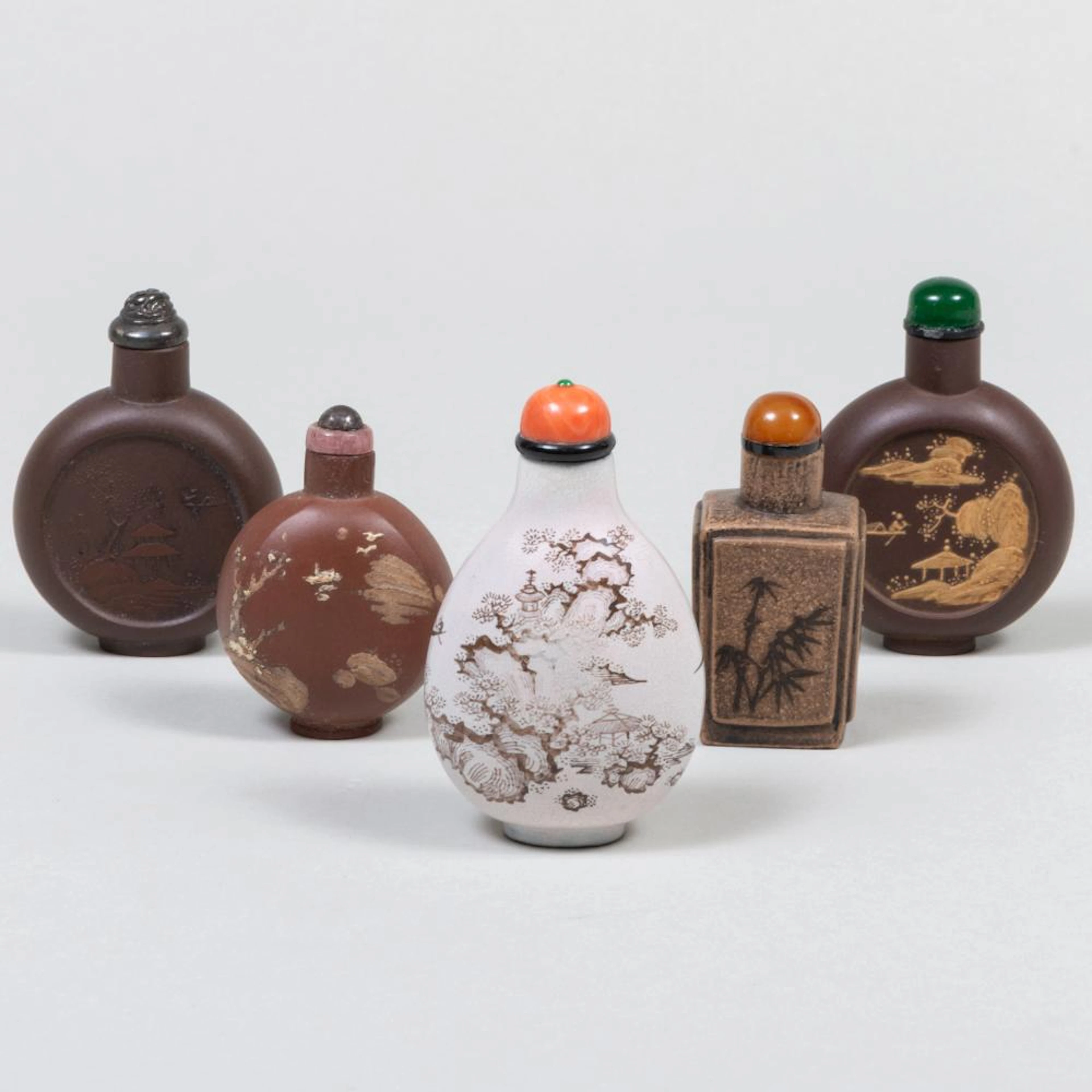 Group of Three Chinese Yixing Snuff Bottles and Two Porcelain Snuff Bottles