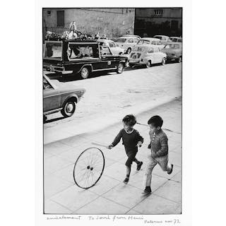 CARTIER-BRESSON, HENRI (1908-2004) "Palerme" (boy with wheel).