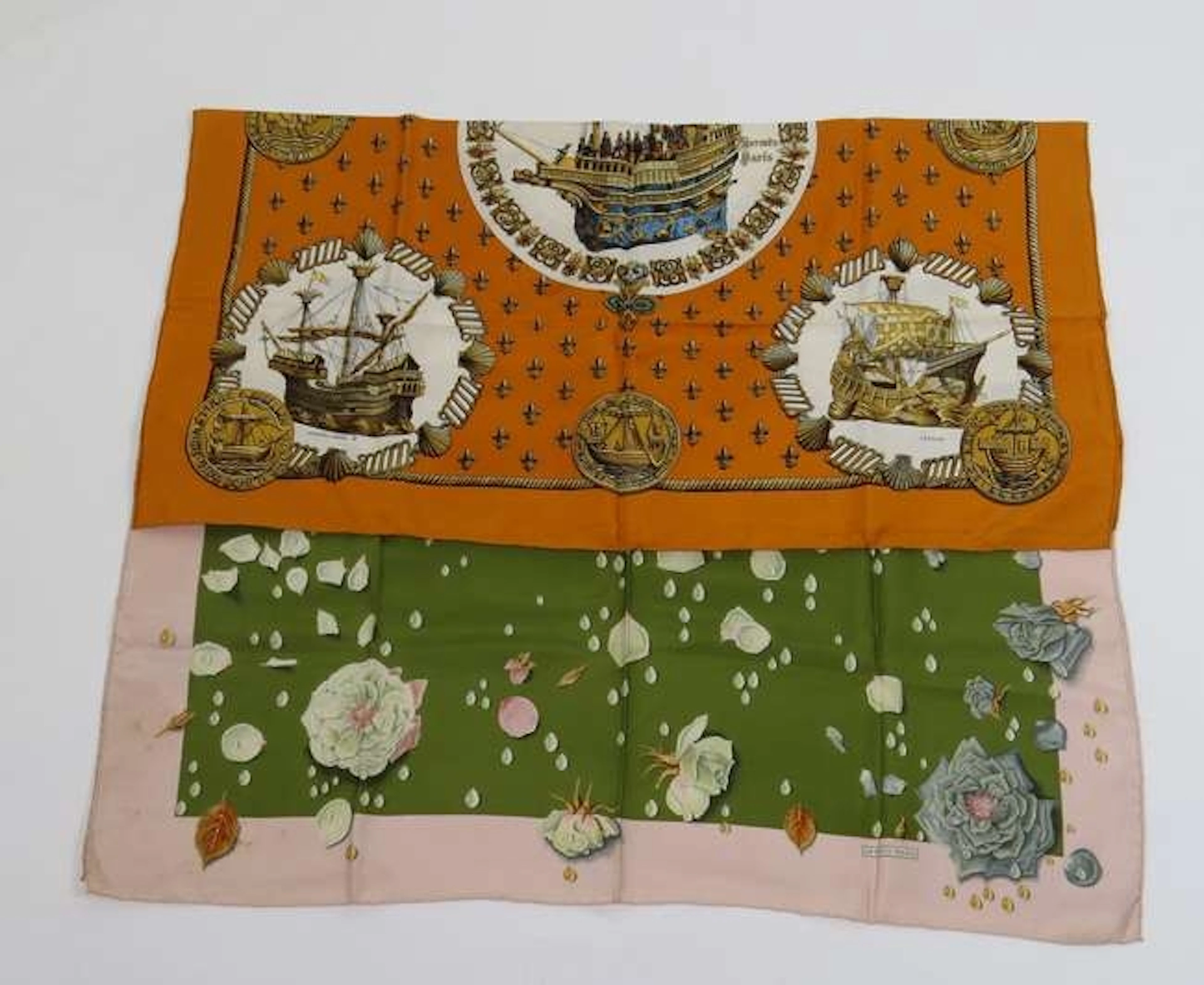 Four Hermès silk scarves, including 'Nefs d'Or', a galleon design on a golden ground, a green and ...