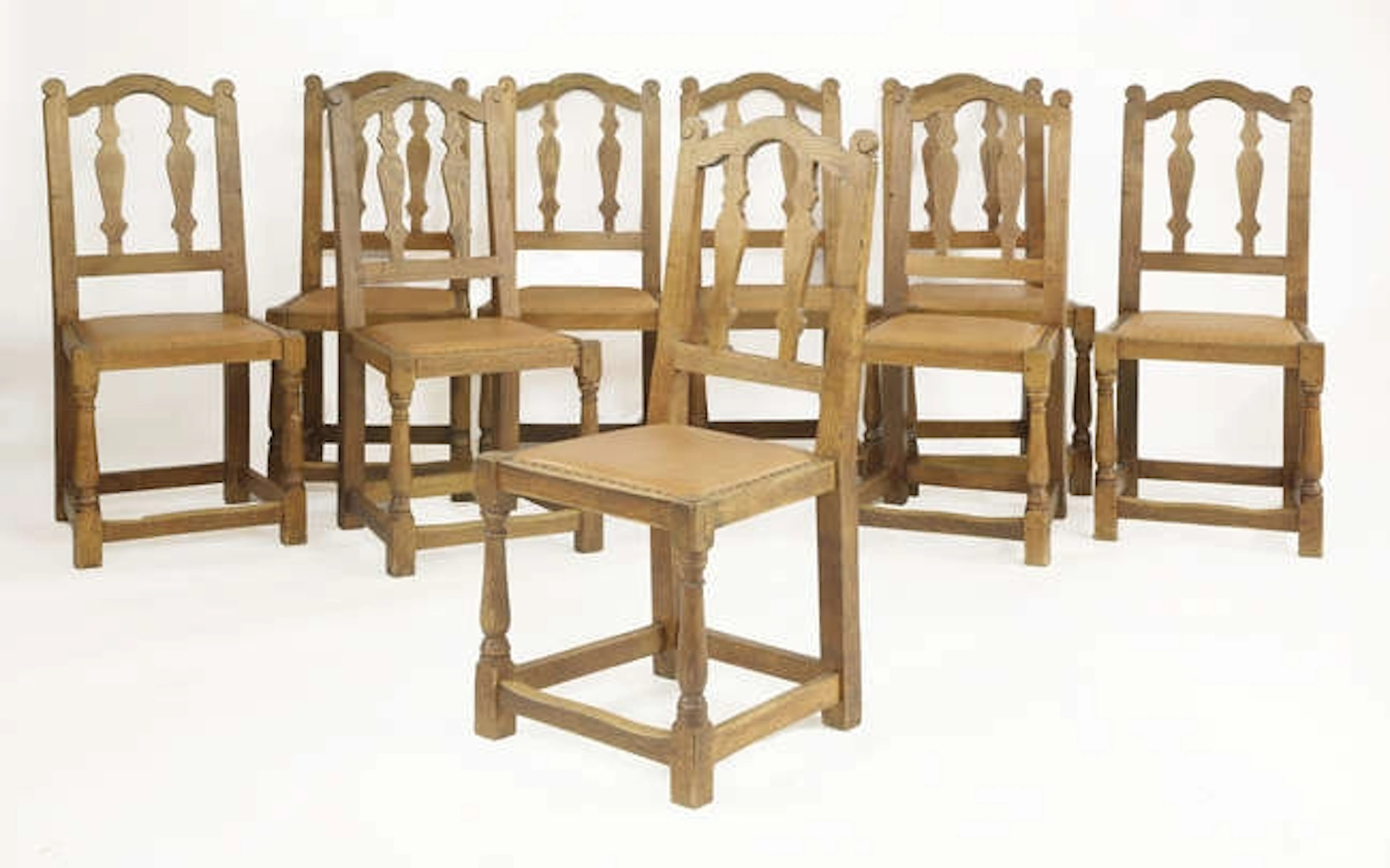 A set of ten Robert 'Mouseman' Thompson dining chairs