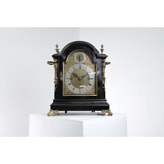 A George III-style ebonised bracket clock