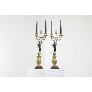 A pair of Regency ormolu and bronze candelabra