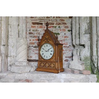 A Victorian oak-cased clock and bracket