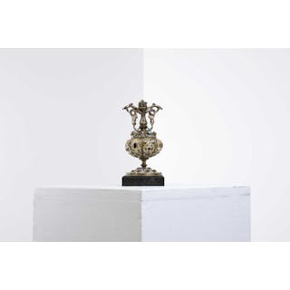 A small gilt-brass urn