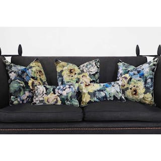 A group of five velvet cushions by Designers Guild