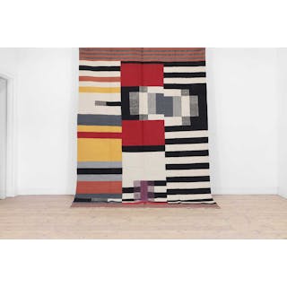 A contemporary Bauhaus-inspired flat-weave carpet