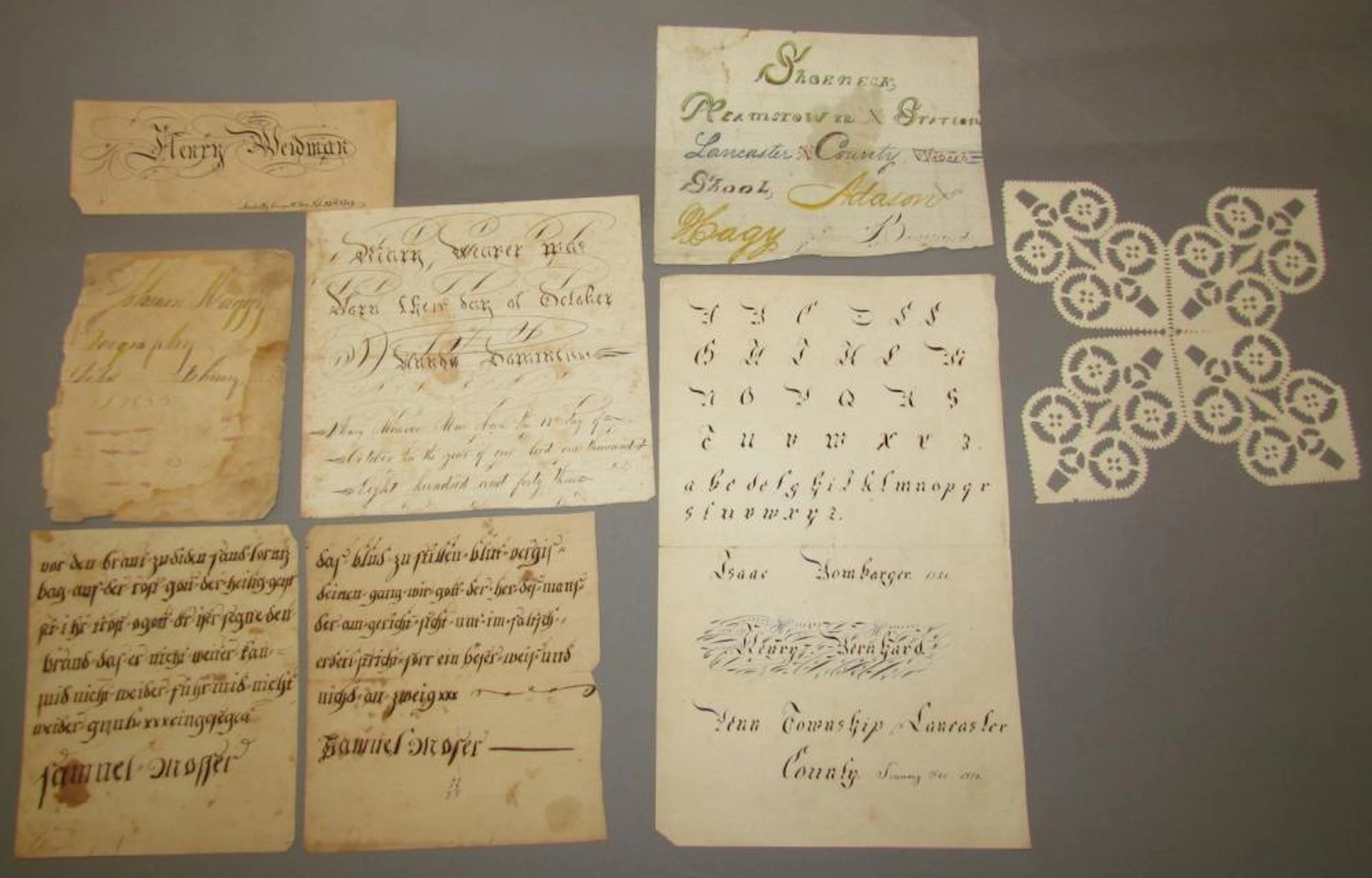 8 assorted unframed pieces