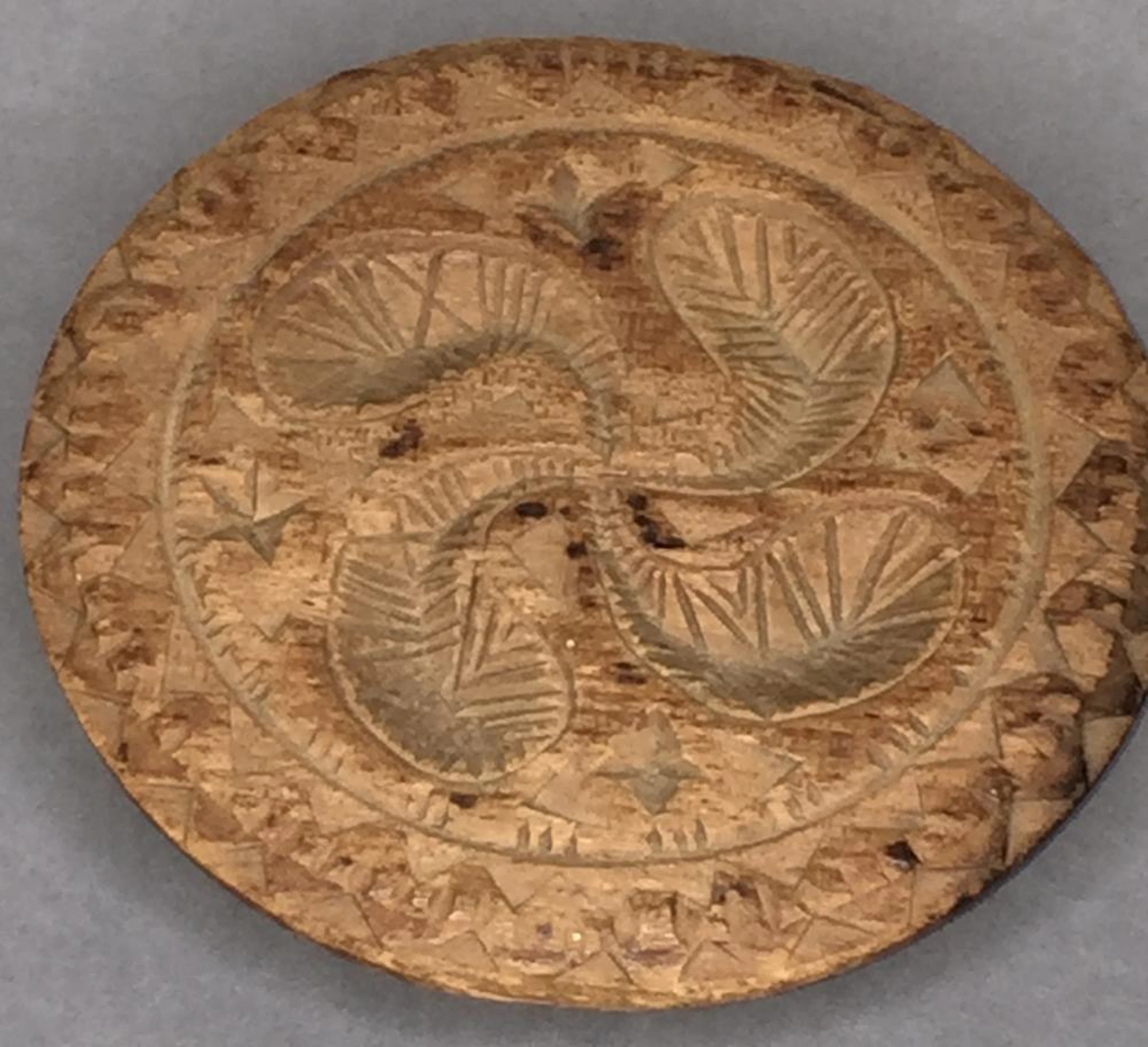 Early carved pine pinwheel design butter print