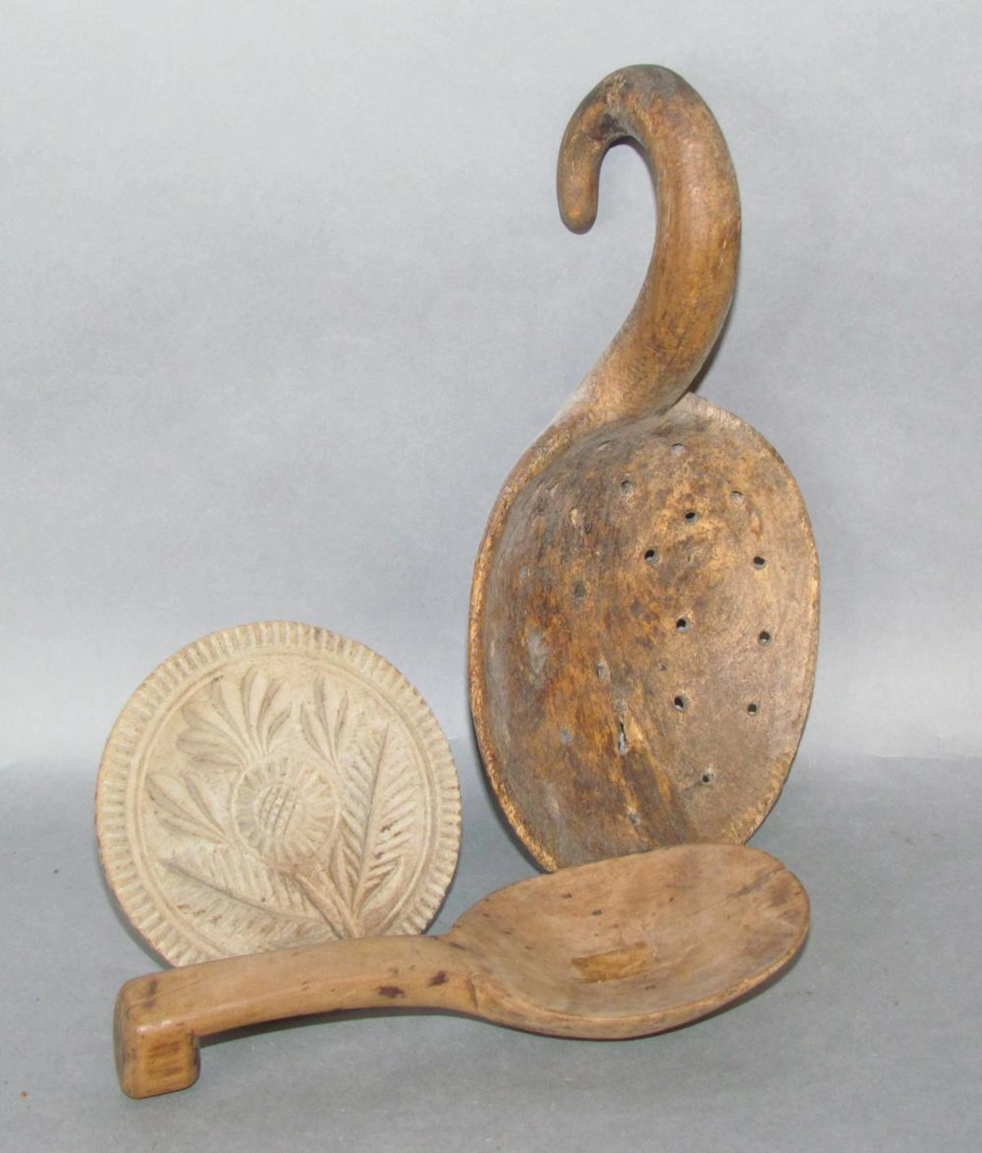 3 wooden kitchen utensils