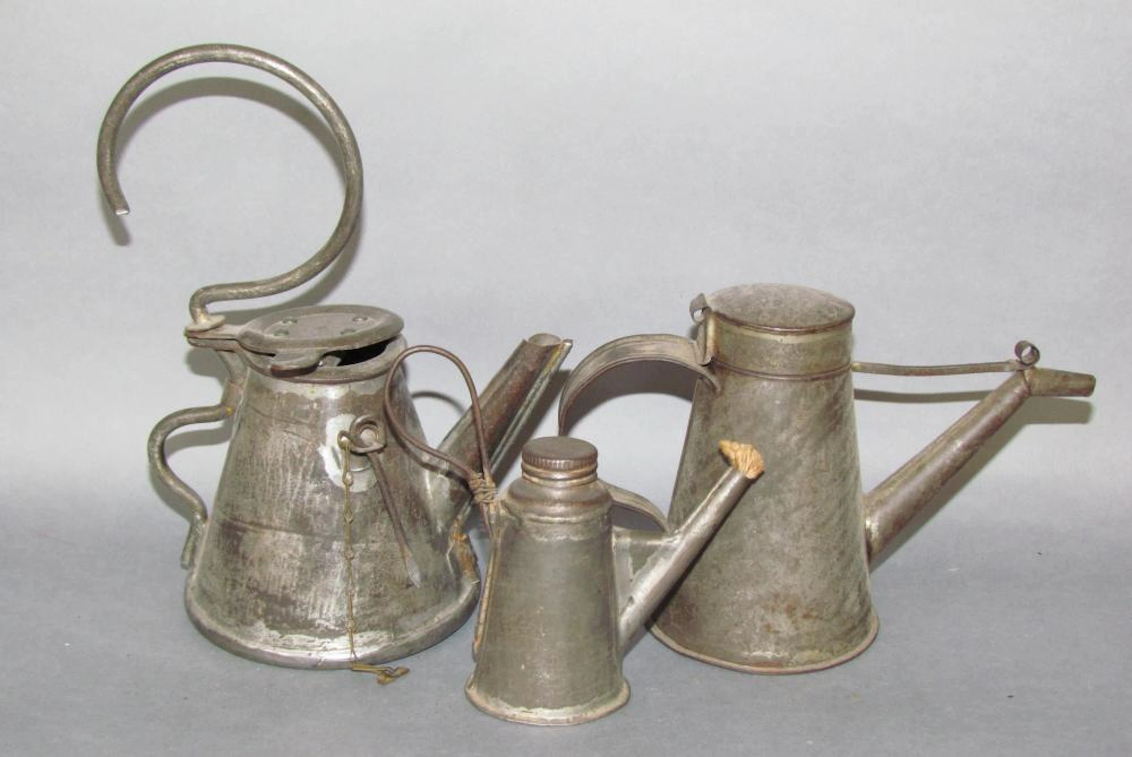 Group of metalware lighting devices