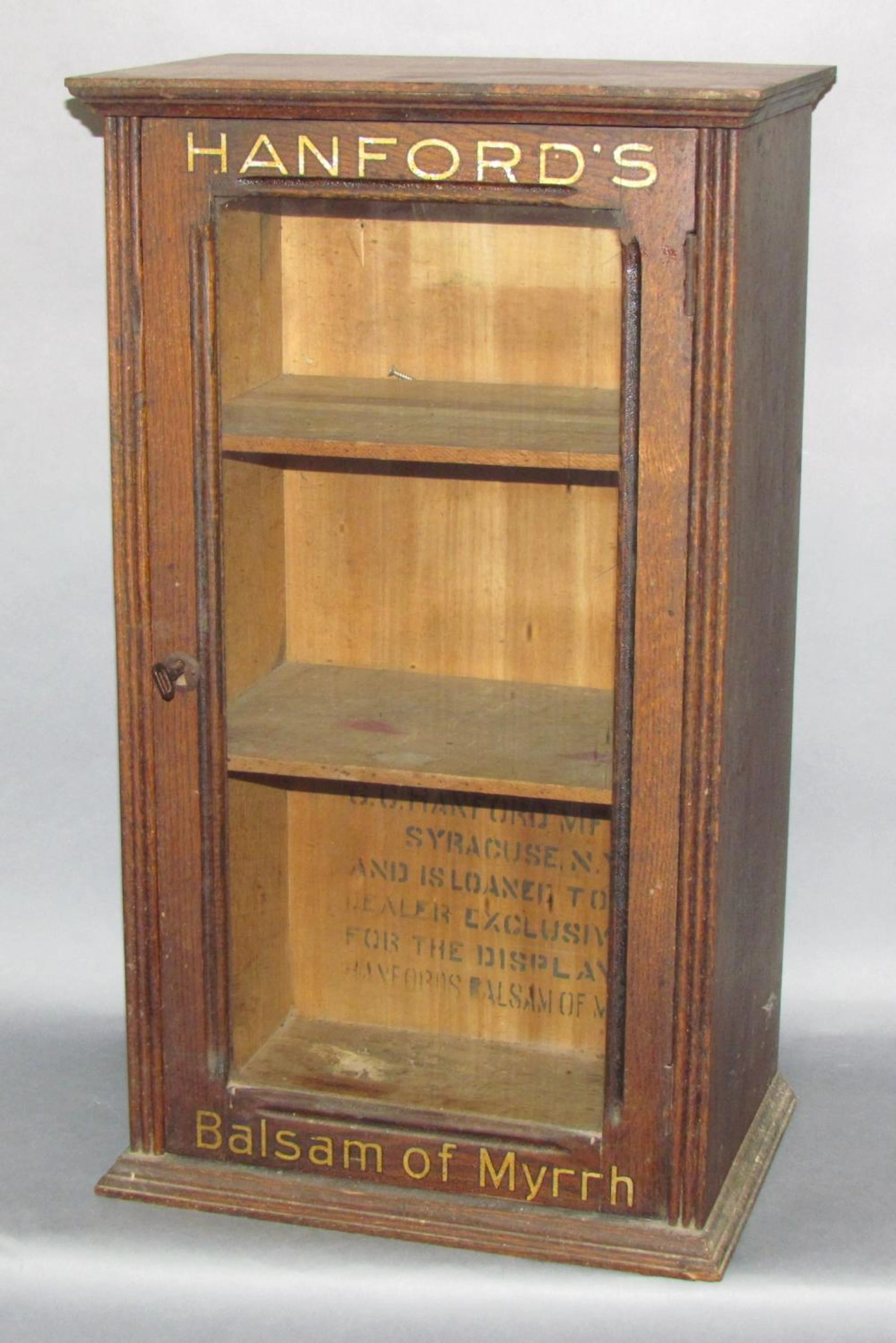 Oak "Hanford's Balsam of Myrrh" store display cabinet